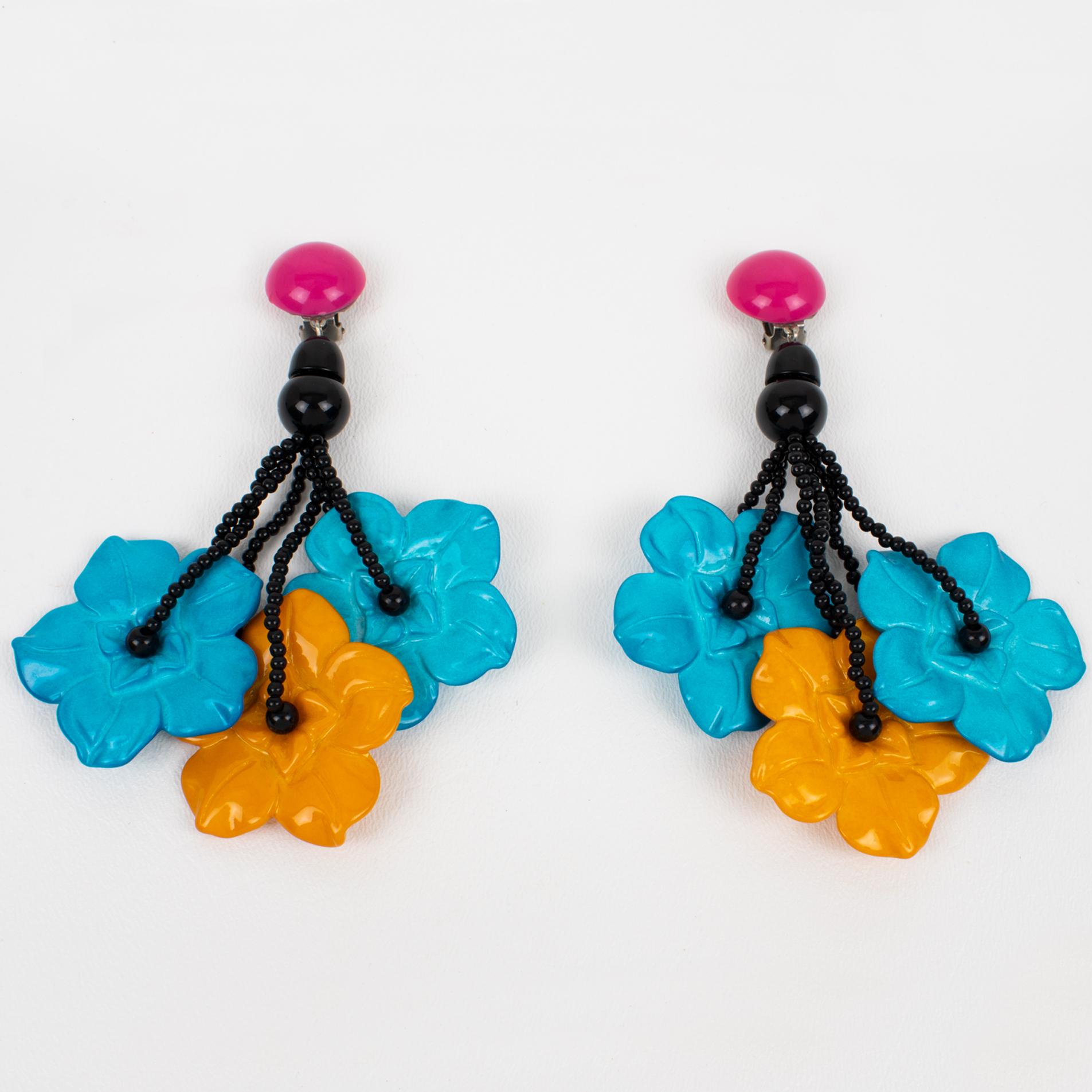 Modern Angela Caputi Turquoise and Yellow Floral Dangle Resin Clip Earrings For Sale