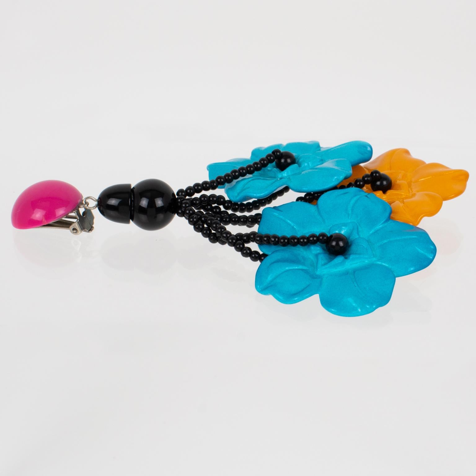 Angela Caputi - Boucles d'oreilles à clip en résine avec fleurs turquoise et jaunes Unisexe en vente