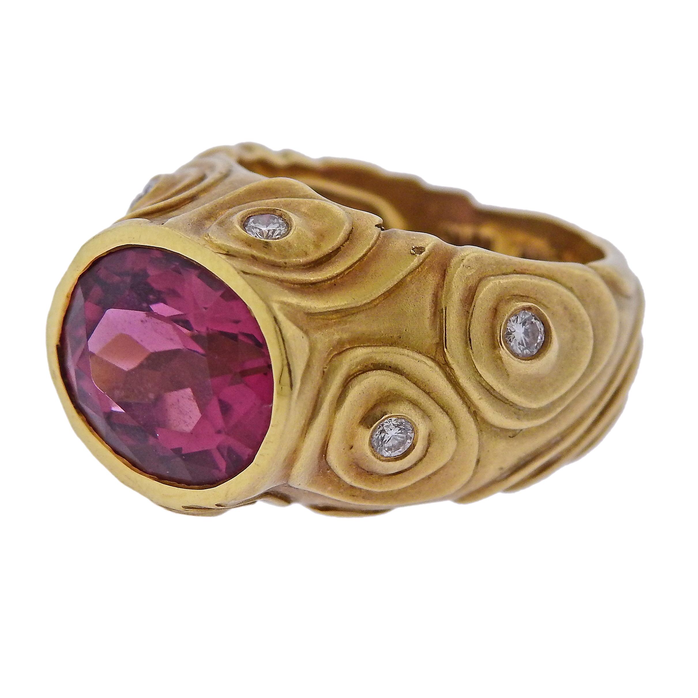 18k yellow gold ring, crafted by Angela Cummings in circa 1988, set with 11.9mm x 10mm rubellite and approx. 0.18ctw in G/VS diamonds.  Ring size - 5.5, ring top is 14mm wide, weighs 14.7 grams. Marked:  Cummings, 1988, 18k .