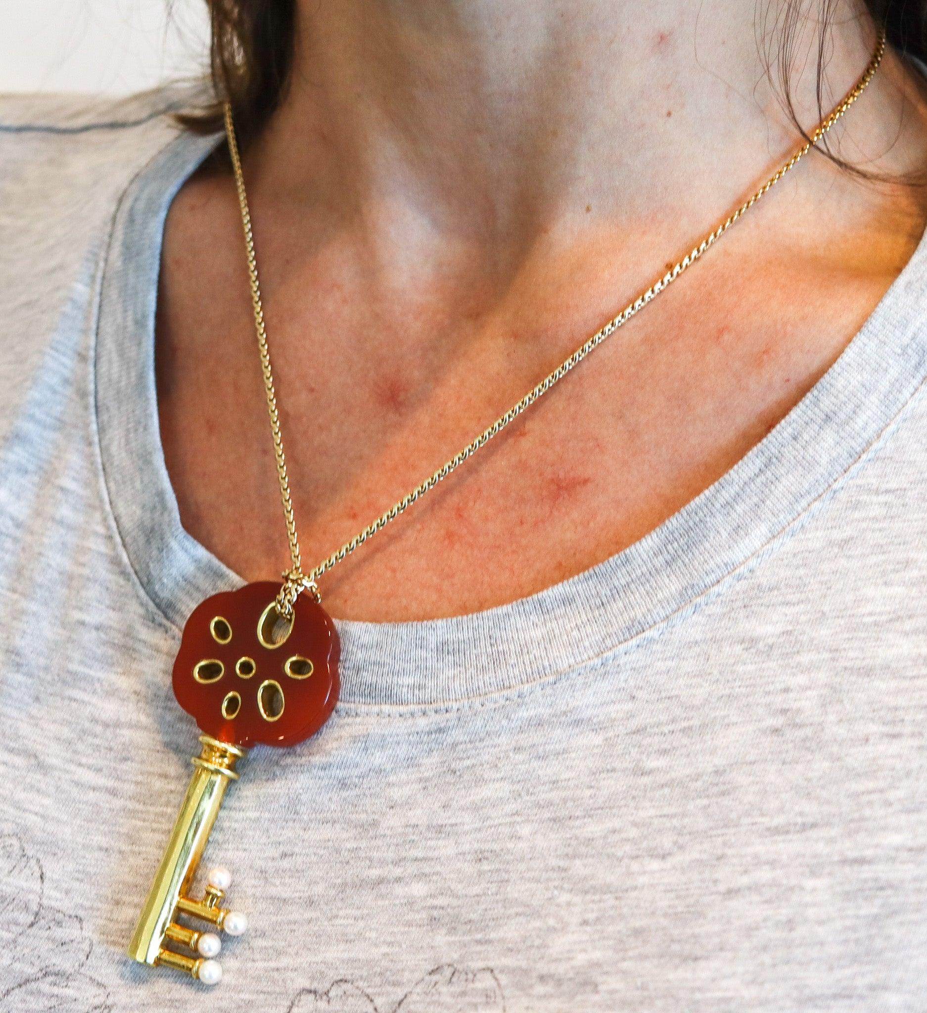 Necklace with key pendant designed by Angela Cummings.

This is beautiful and rare key pendant-chain, created by Angela Cummings, back in the late 1980's. The modernist piece has been crafted in the shape of three-dimensional large key, made up in