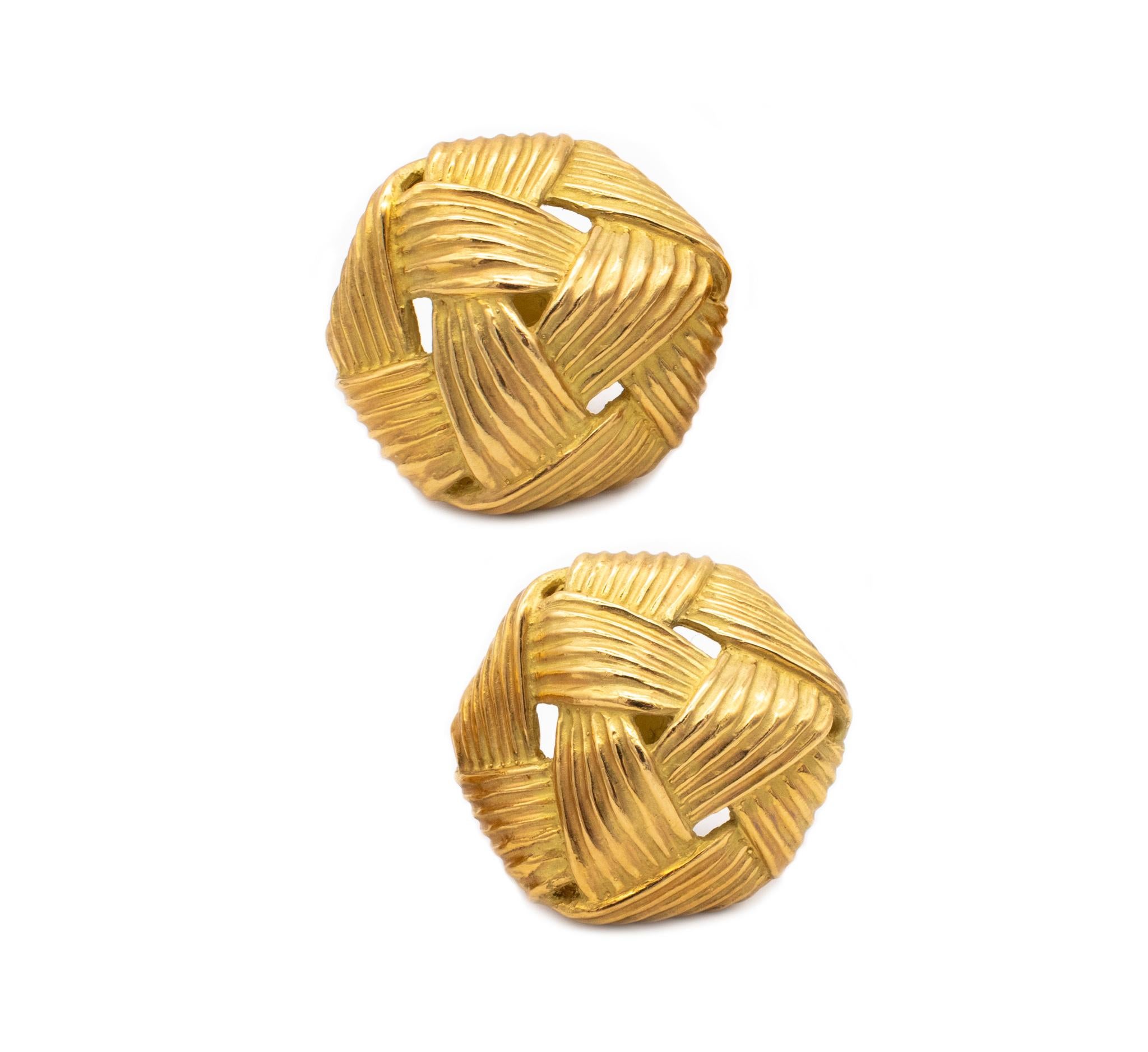 Rare pair of earrings designed by Angela Cummings.

An elegant pair of textured earrings, created back in the 1984 at the Cummings studio in New York city. This vintage rare pieces are made as a mirrored pair and was crafted in solid yellow gold of