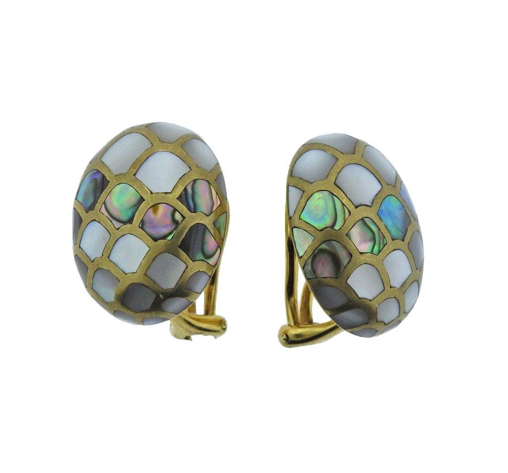  Pair of 18k yellow gold abalone shell earrings crafted by Angela Cummings. Earrings are 22mm X 18mm. Marked - Angela Cummings, 1984, 18k. Weight - 15.7 grams. 

