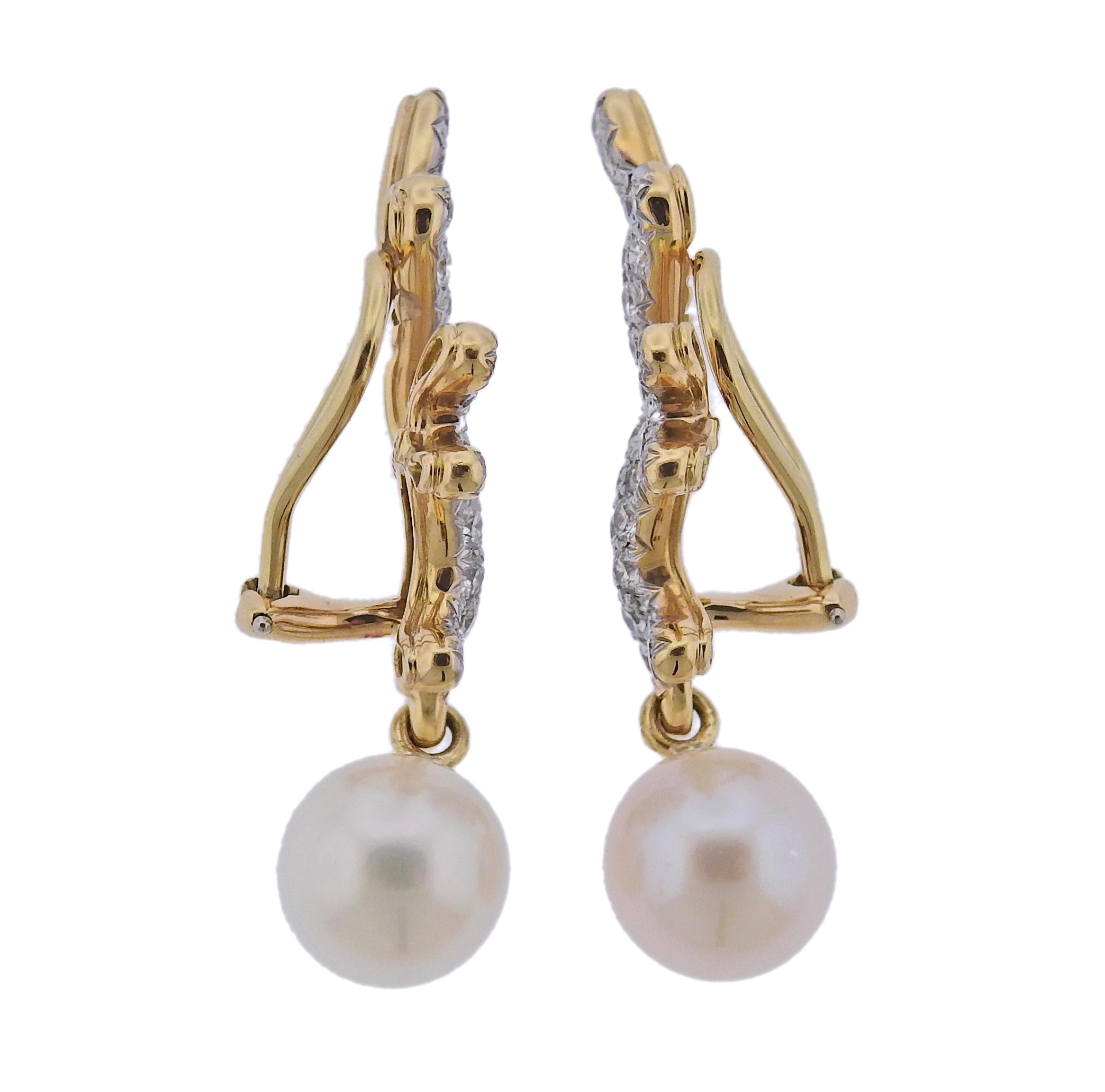 Pair of  18k gold new without tags earrings by Angela Cummings and Assael, with 11mm South Sea pearls and 1.95tw G/VS diamonds. Retail $14500. Come with pouch.  Earrings are 46mm long. Weight - 15.4 grams. Marked: Assael, Angela Cummings, 750.