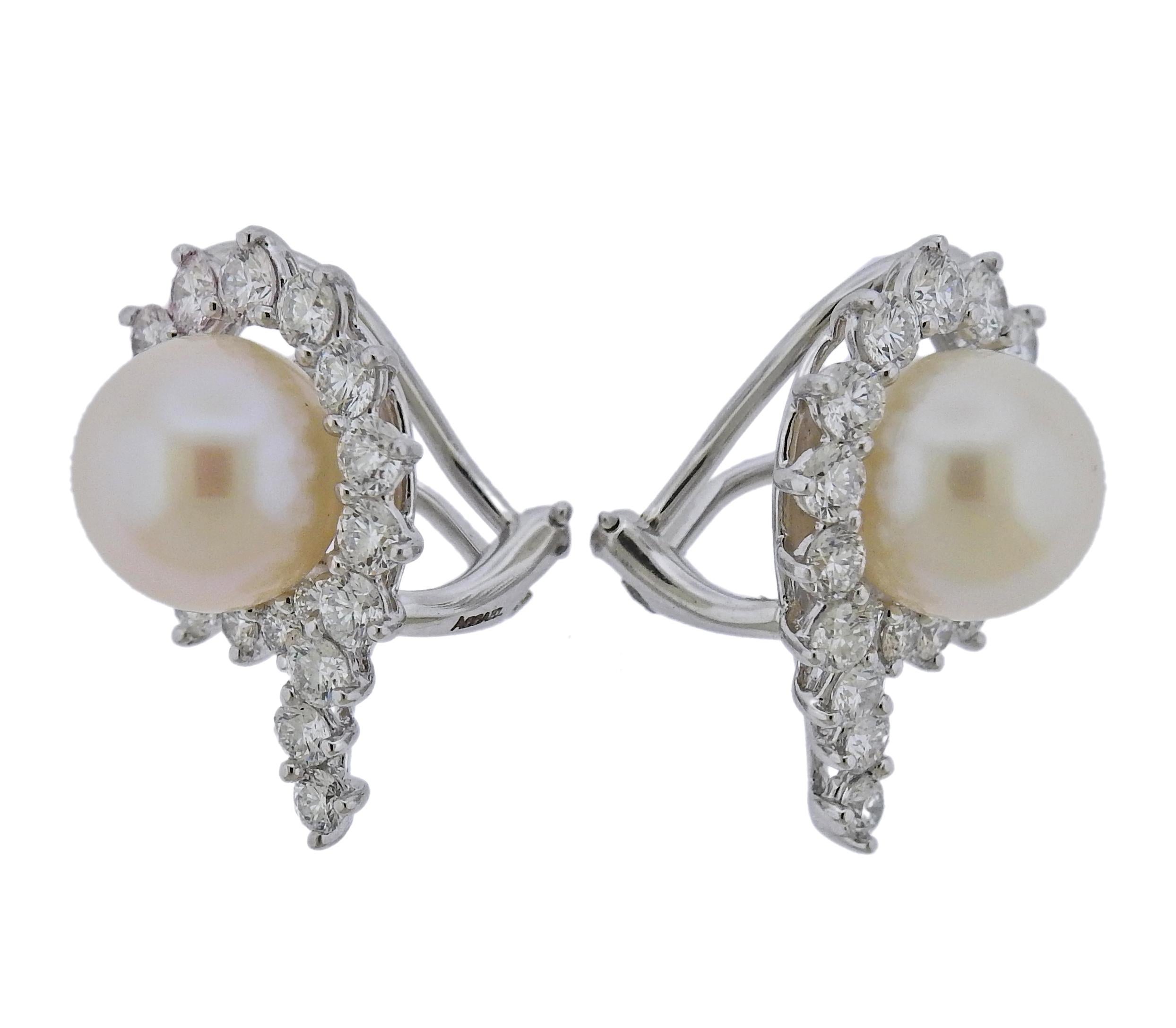 Pair of  platinum and 18k gold new without tags earrings by Angela Cummings and Assael, with 10.6mm South Sea pearls and 2.95ctw G/VS diamonds. Retail $20500. Come with pouch. Earrings are 25mm x 17mm. Weight - 14.1 grams. Marked: Cummings, Assael,