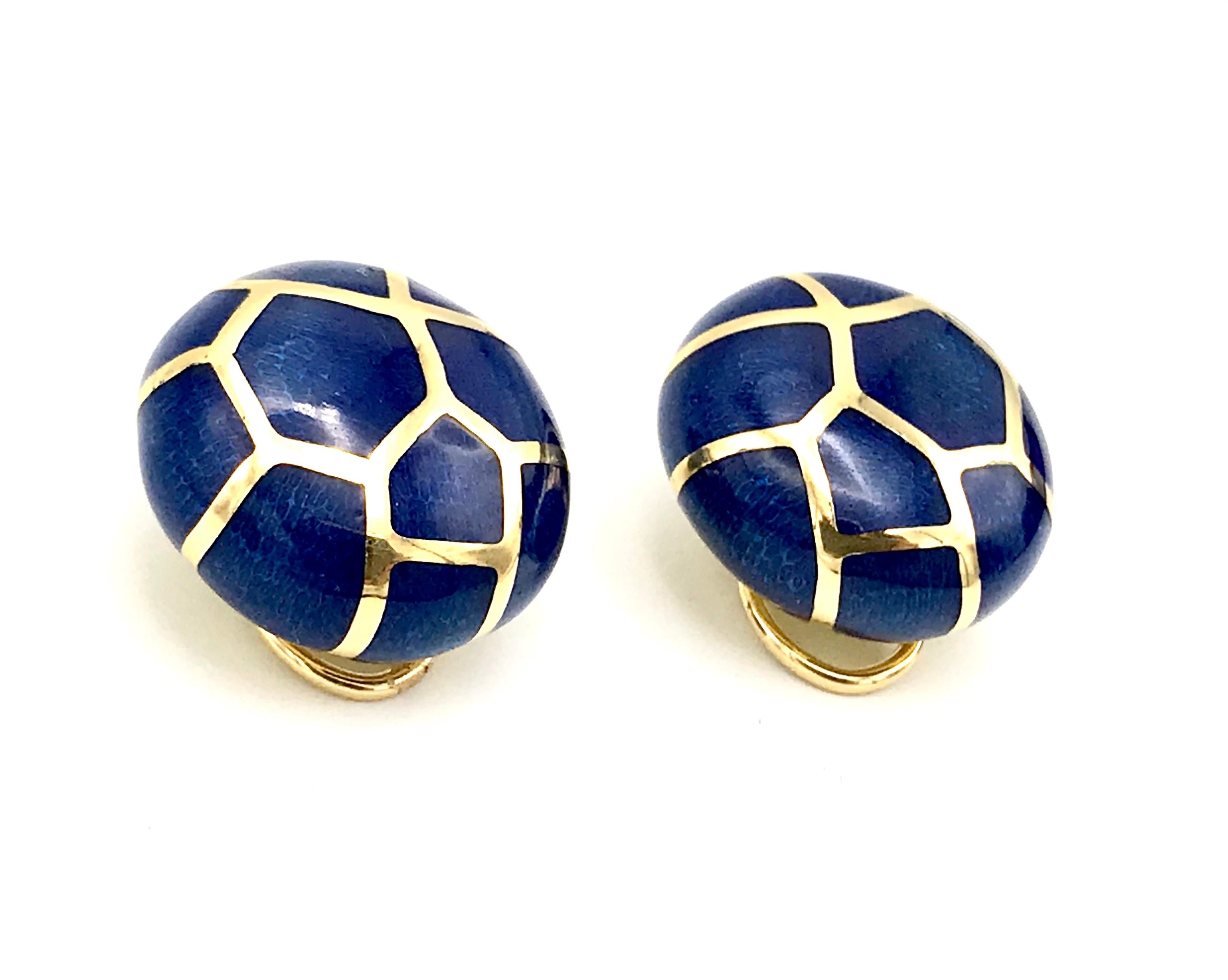 Gorgeous button clip-on earrings by Angela Cummings. Made of 18k yellow gold and blue enamel. Features omega clips; posts can be added. Enamel is fully intact. Stamped with Angela Cummings maker's mark and a hallmark for 18k gold.
Measurements: