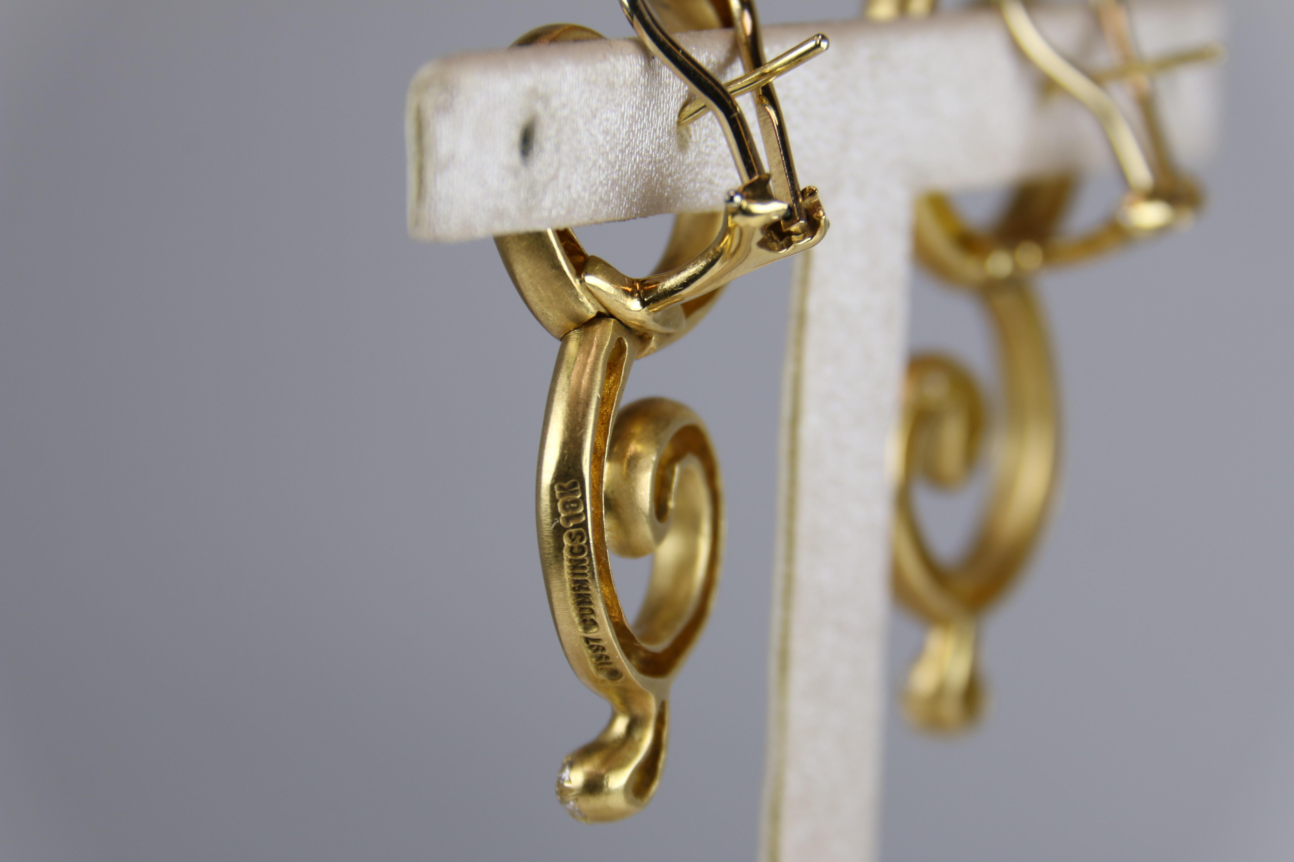 Stunning Angela Cummings Yellow Gold and Diamond Earrings.  Elegant statement piece with just the right flair.  