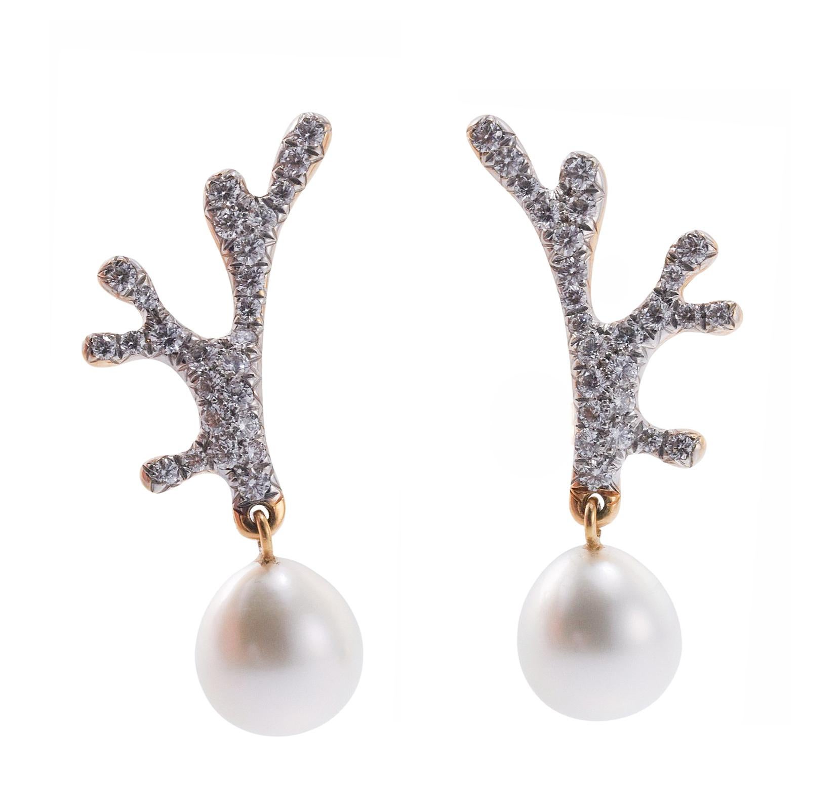 Pair of coral motif 18k gold earrings, crafted by Angela Cummings in collaboration with Assael, set with 12mm  South Sea  pearls, and approx. 1.95ctw G/Vs diamonds. The current retail on the pair is $ 14500.  Th earrings are 1.75