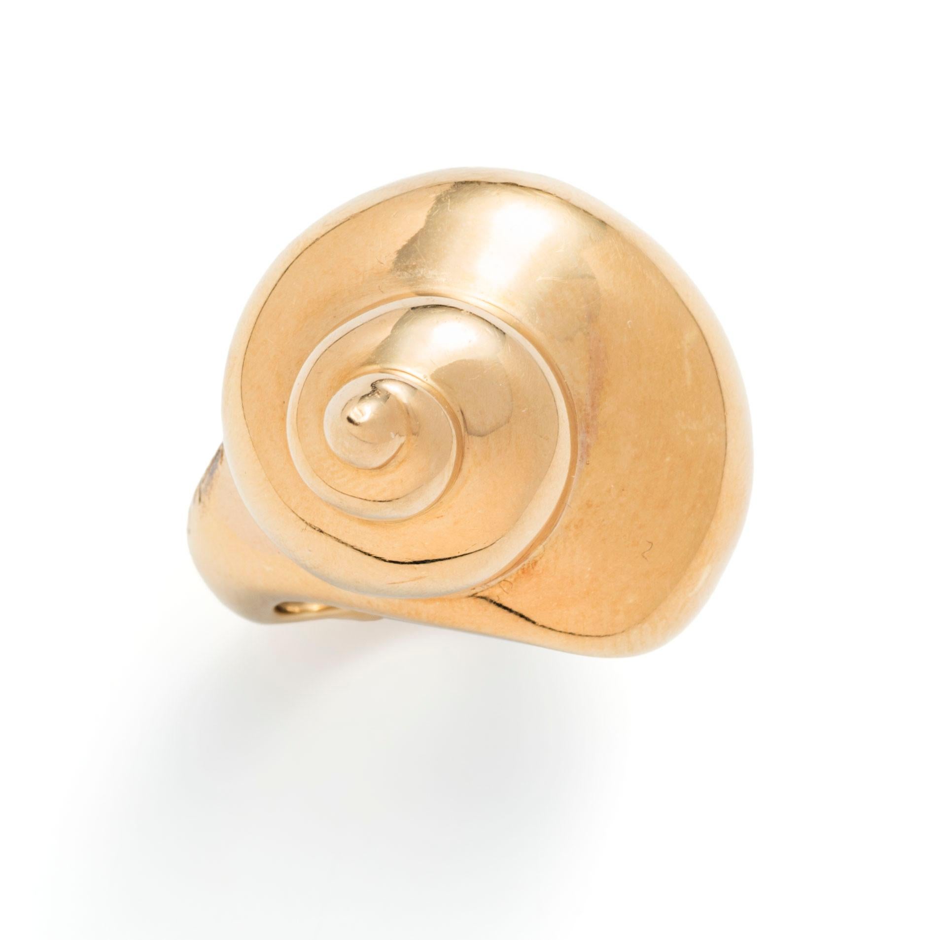 Angela Cummings began designing for Tiffany & Co. in 1968 under the direction of Donald Claflin. Her work, inspired by the organic forms of natural world, was an instant hit. This dramatically scaled shell form ring is sculpted in 18k yellow gold