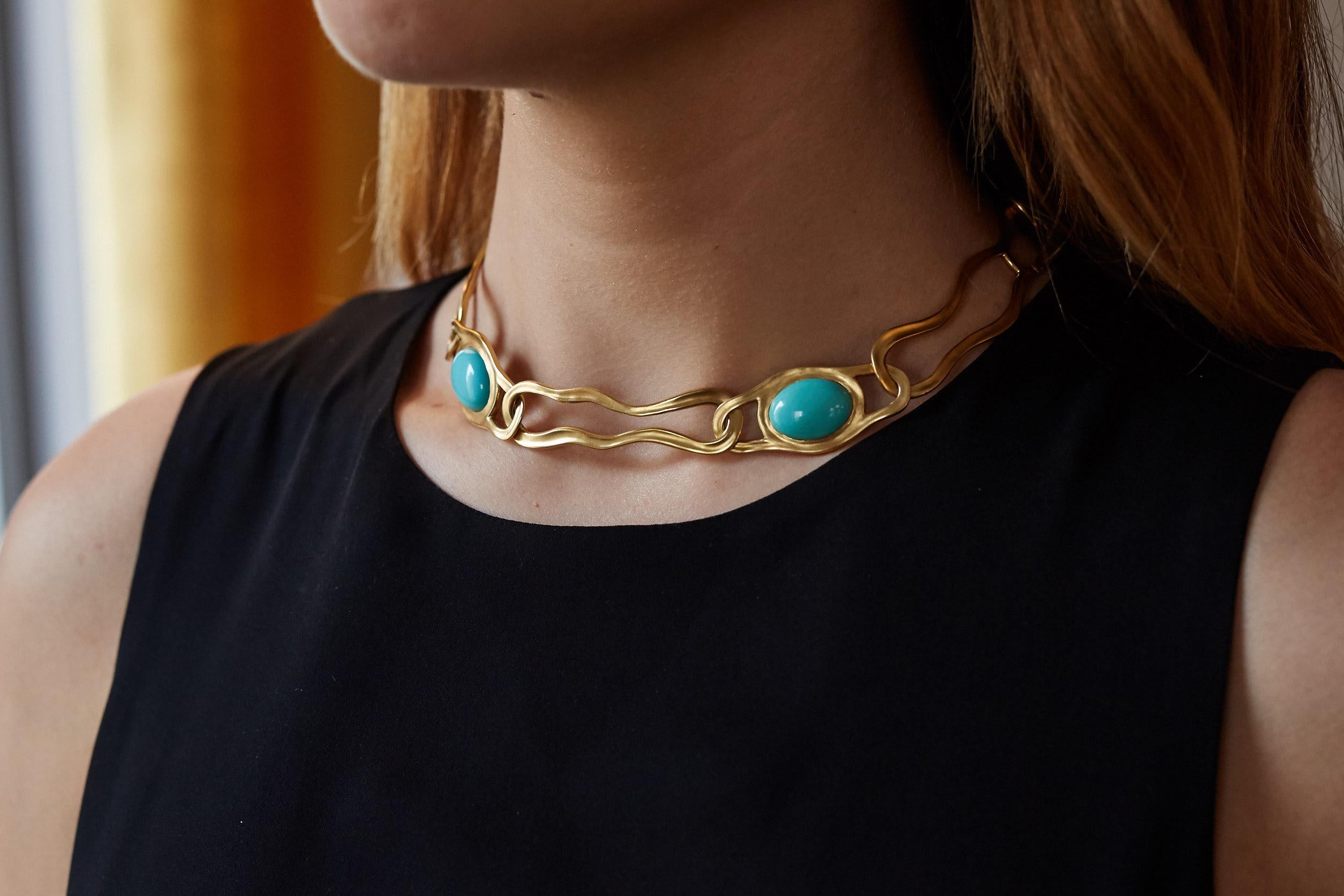 A vintage, 18 karat yellow gold and large cabochon natural Persian turquoise large link necklace, by Angela Cummings for Tiffany & Co., 1982. Signed Tiffany & Co. and Cummings. Stamped 18k and dated 1982. This elegant, modern link necklace sits