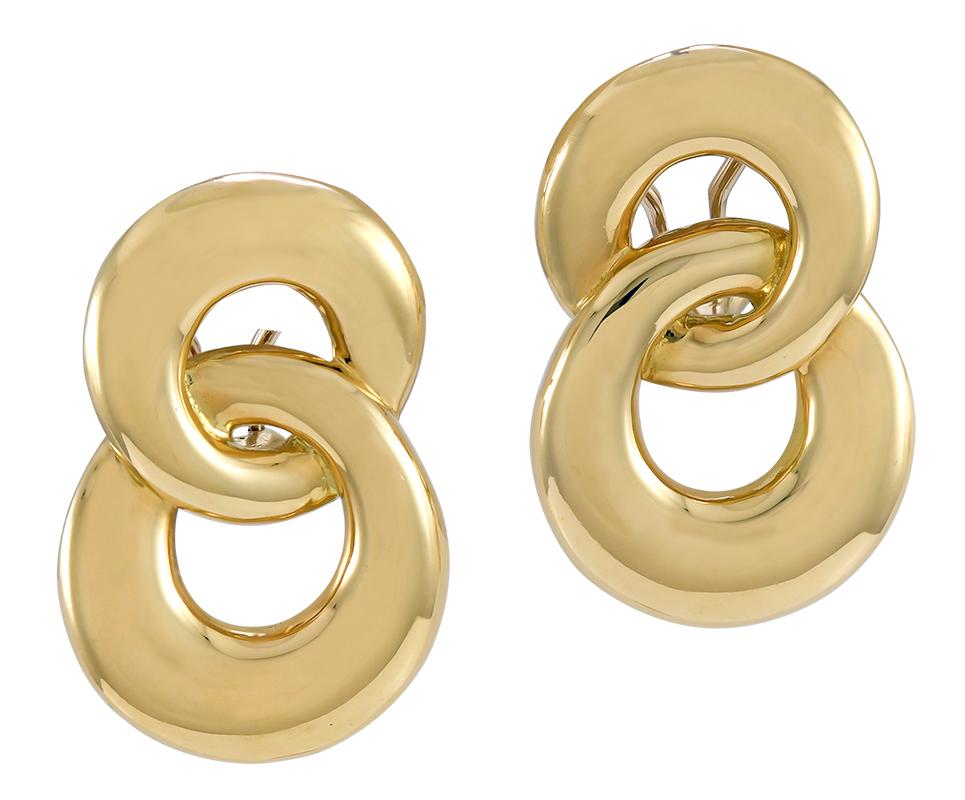 Attractive, wearable 18K gold earrings.  Made and signed by Angela Cummings in 1988.  Soft sculptured design with fine matte finish.  1 1/3 