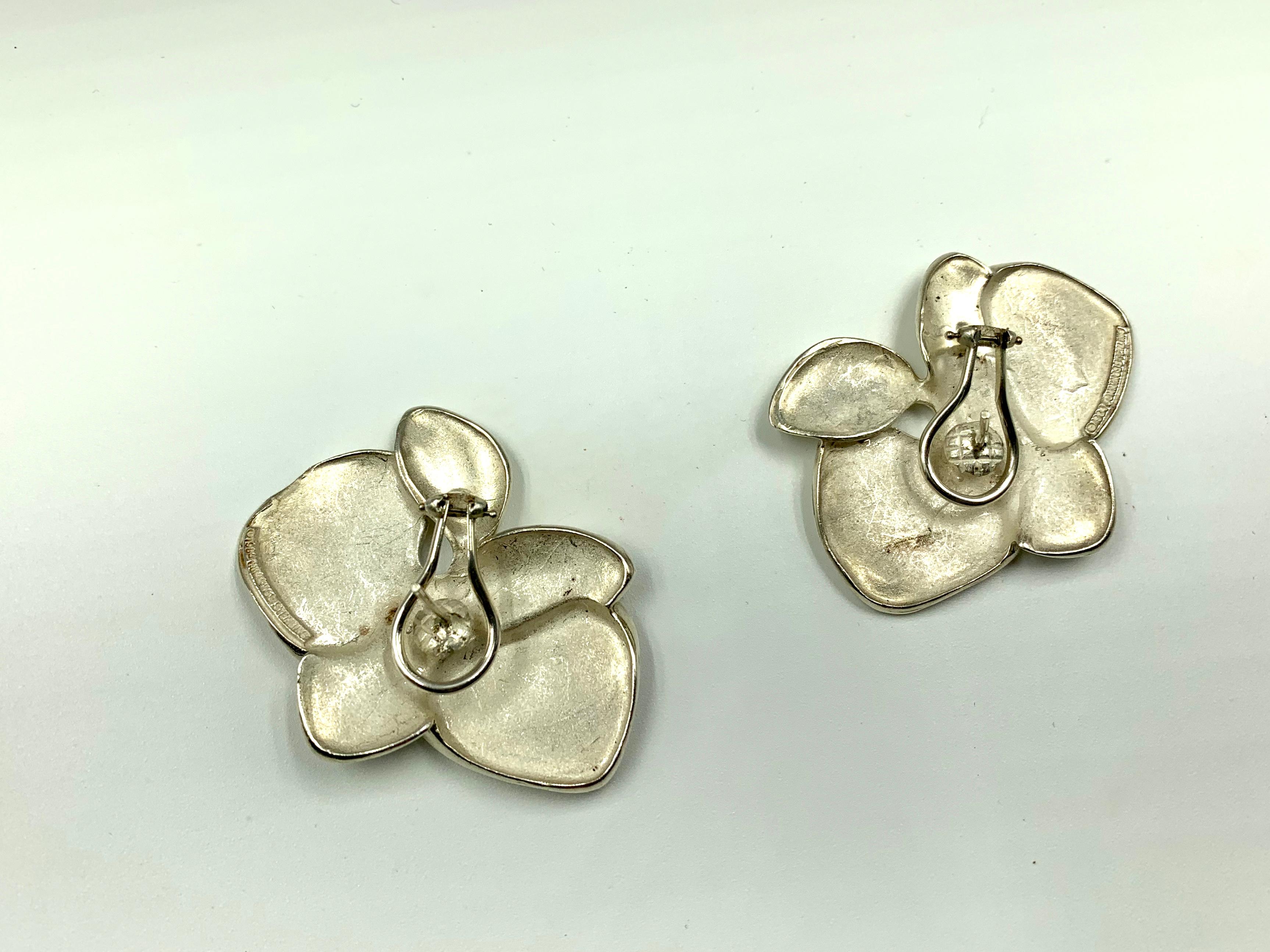 Orchid earrings in sterling silver from Angela Cumming's iconic first collection as an independent designer when she left Tiffany's to establish her own boutique at Bergdorf Goodman in 1984. She had not been allowed to sign her own works in silver