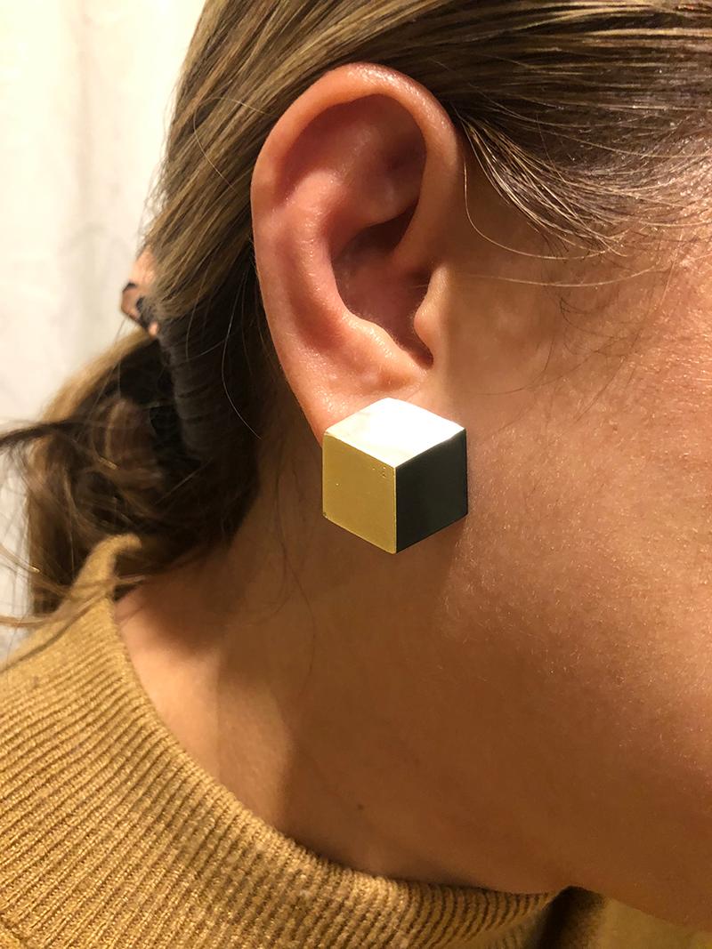 Striking three dimensional cube earrings.  Made and signed by ANGELA CUMMINGS.  18K yellow gold inlaid with onyx and mother of pearl. 
The large size:  approximately 1