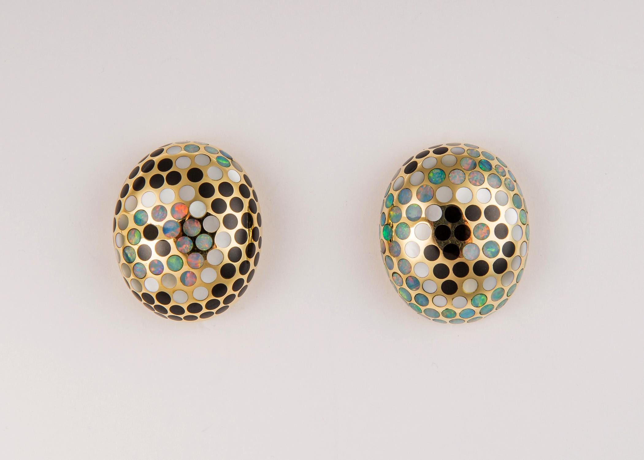 This is a rare pair of Angela Cummings earrings. The small polka dot pattern using black onyx white mother of pearl and opal is a brilliant playful design. This pair measures 1 1/8  X  7/8's of an inch.  Angela Cummings left Tiffany & Co. in 1983 to