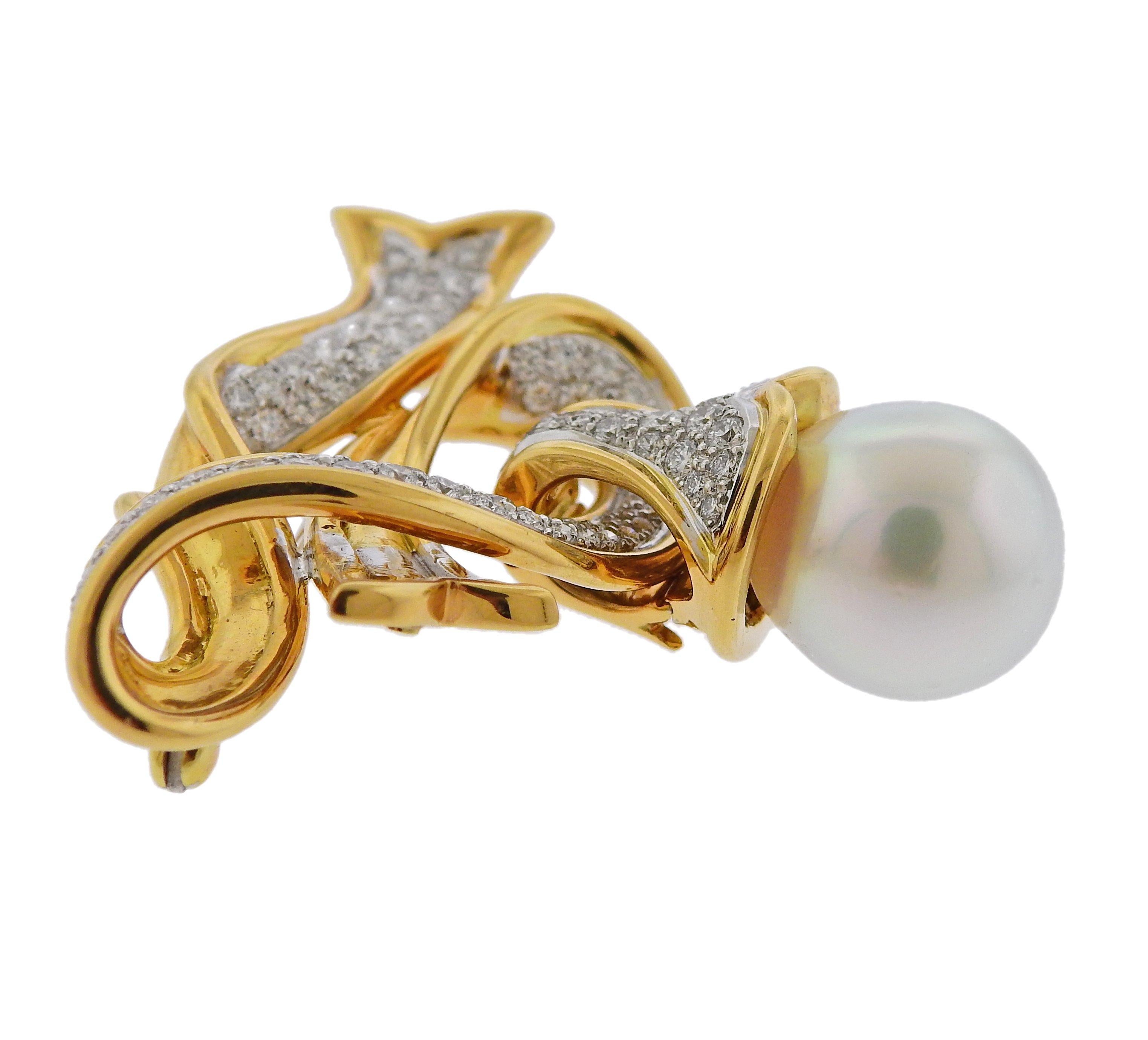 Impressive 18k gold and platinum brooch pendant by Angela Cummings, set with 13.9mm South Sea pearl and 2.74ctw in FG/VS diamonds. Brooch measures 45mm x 46mm, bottom pendant is removable 28mm x 16mm. Marked: Cummings, Assael, pt950, 750. Weight is