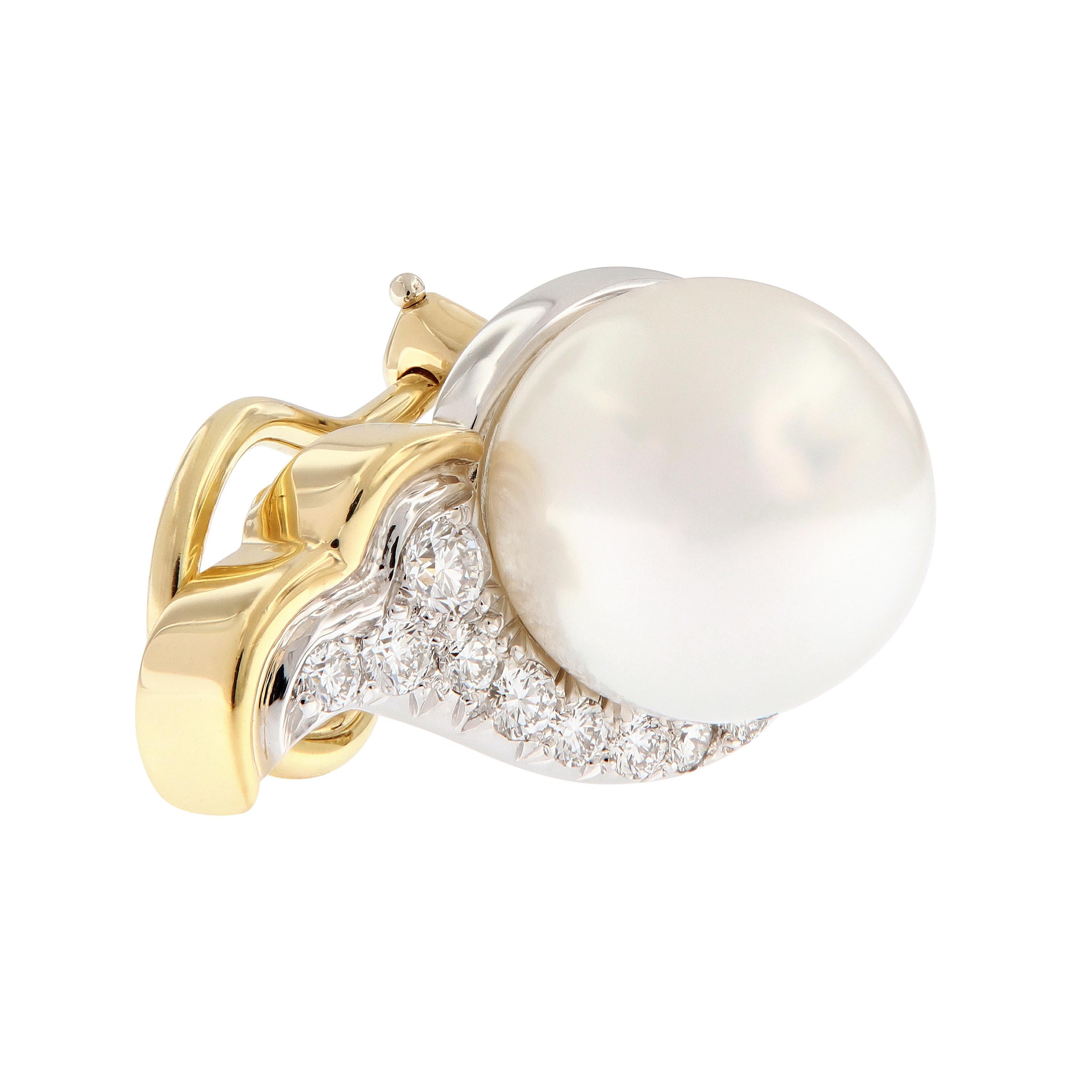 Stunning South Sea cultured pearls are wrapped in a scalloped row of Diamonds and 18k yellow gold and platinum. Designed by Angela Cummings for Assael of New York.  Marked Angela Cummings.

South Sea Pearls 10.7mm x 10.7mm. 
Diamonds 0.48 cttw.