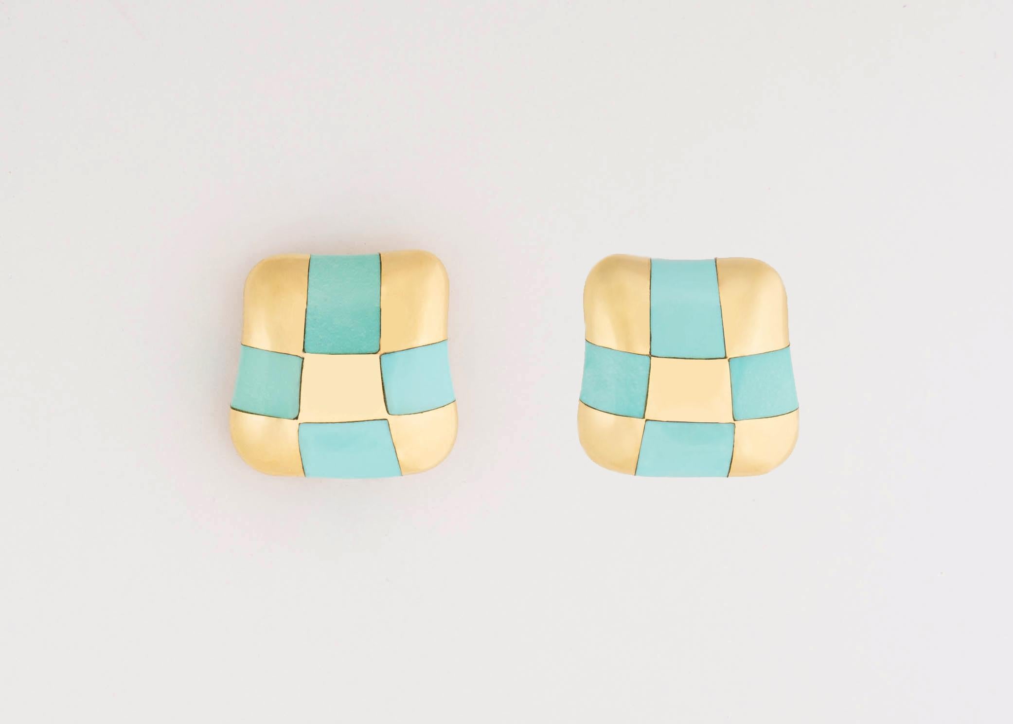 Angela Cummings began her career under the Tiffany & Co. umbrella before setting out on her own. Her designs featuring inlay stones in simple geometric patterns have become iconic and collectable.  This pair featuring turquoise is rarely available.