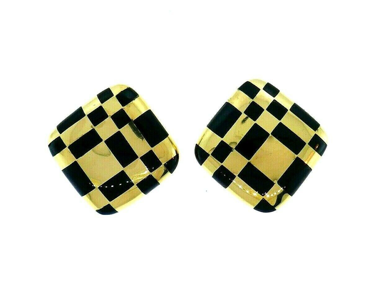 18k polished yellow gold with black enamel inlay design earrings, crafted by Angela Cummings in 1990s. 
Stamped with the Angela Cummings maker's mark and a hallmark for 18k gold. 
Measurements: 1 7/8