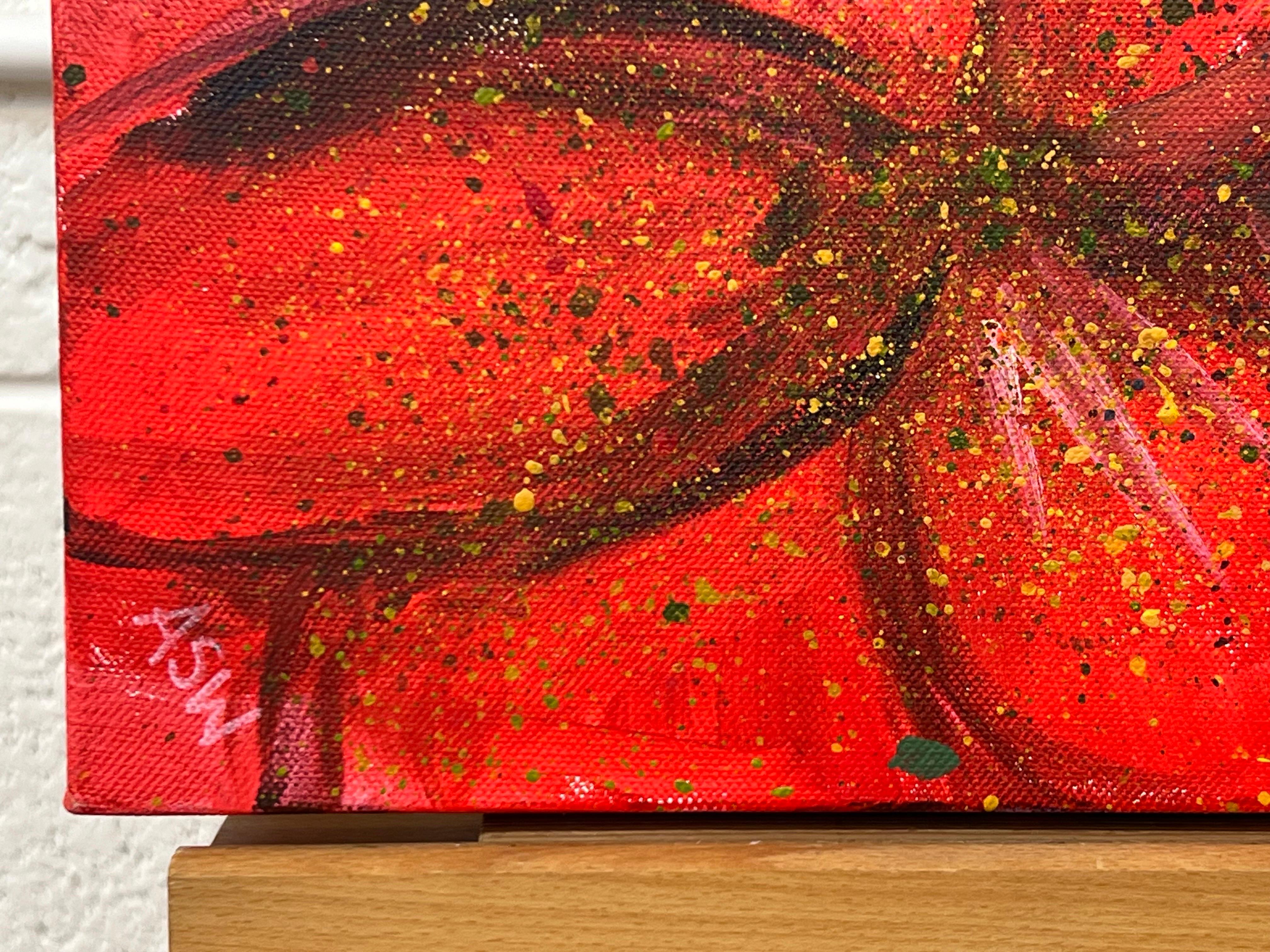 Un vibrante fiore rosso astratto con spruzzi di verde e giallo su tela 4