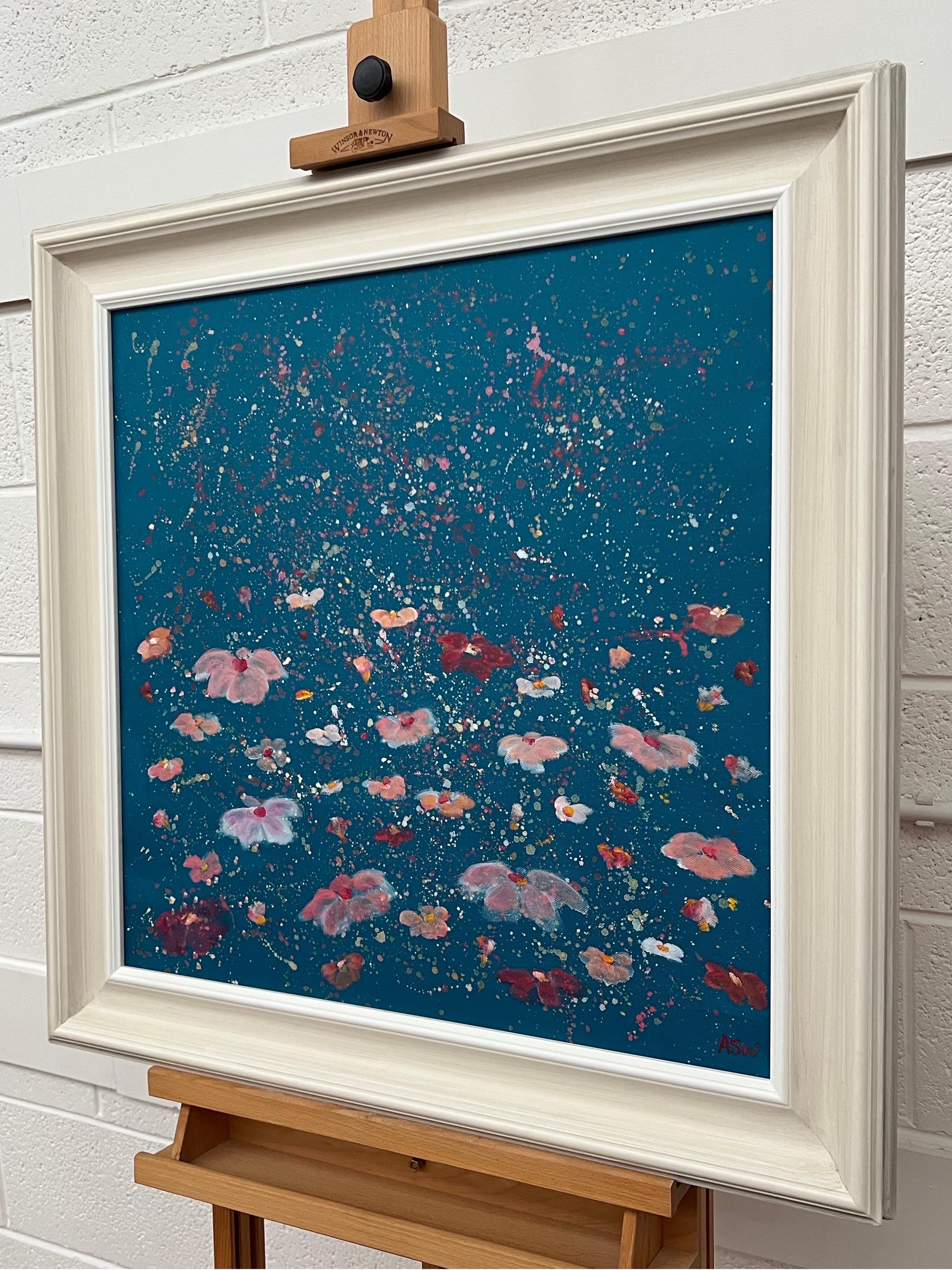 Abstract Landscape Art with Pink Flowers on a Deep Blue Turquoise Background by Contemporary British Artist, Angela Wakefield. This original is from the 'Spring Burst' Interior Design Series. Framed in the highest quality hand-finished contemporary
