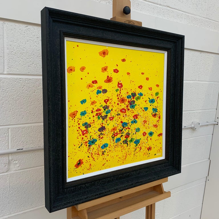 Painting of Abstract Red, Pink, Orange & Blue Wild Flowers on a Yellow Background by British Landscape Artist, Angela Wakefield. From the 'Spring Burst' Interior Design Series. Framed in a high quality contemporary off-black wooden moulding. 

Art