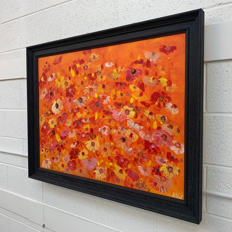 Painting of Abstract Red, Pink, Yellow & White Wild Flowers on an Orange Background by British Contemporary Artist, Angela Wakefield. From the 'Spring Burst' Interior Design Series. Framed in a high quality contemporary off-black wooden moulding.