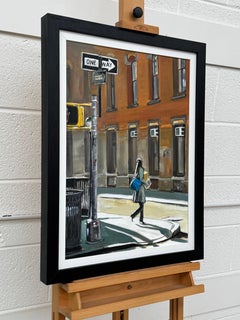 Female Figure in New York City in Fall Sunshine on Sidewalk Street Corner