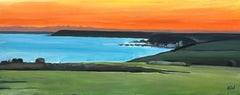 Panoramic Coastal Scene of Devon Coastline with Orange Sunset on English Channel