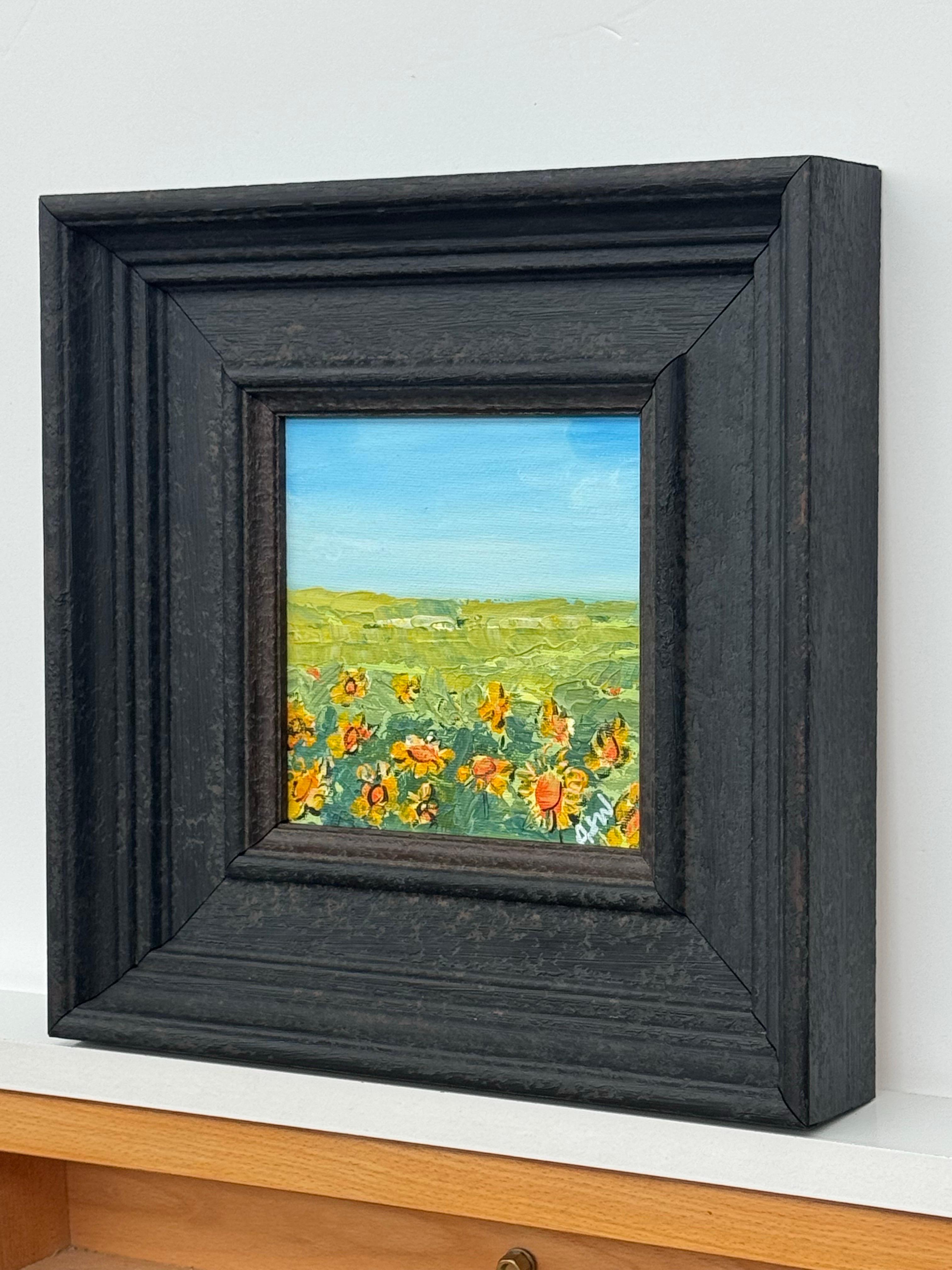 Small Square Abstract Landscape Canvas Art Study of Sunflower Field by Contemporary Artist, Angela Wakefield

Art measures 6 x 6 inches
Frame measures 11 x 11 inches

Angela Wakefield – “Sunflowers Under a Cerulean Sky” – Unique Original Miniature