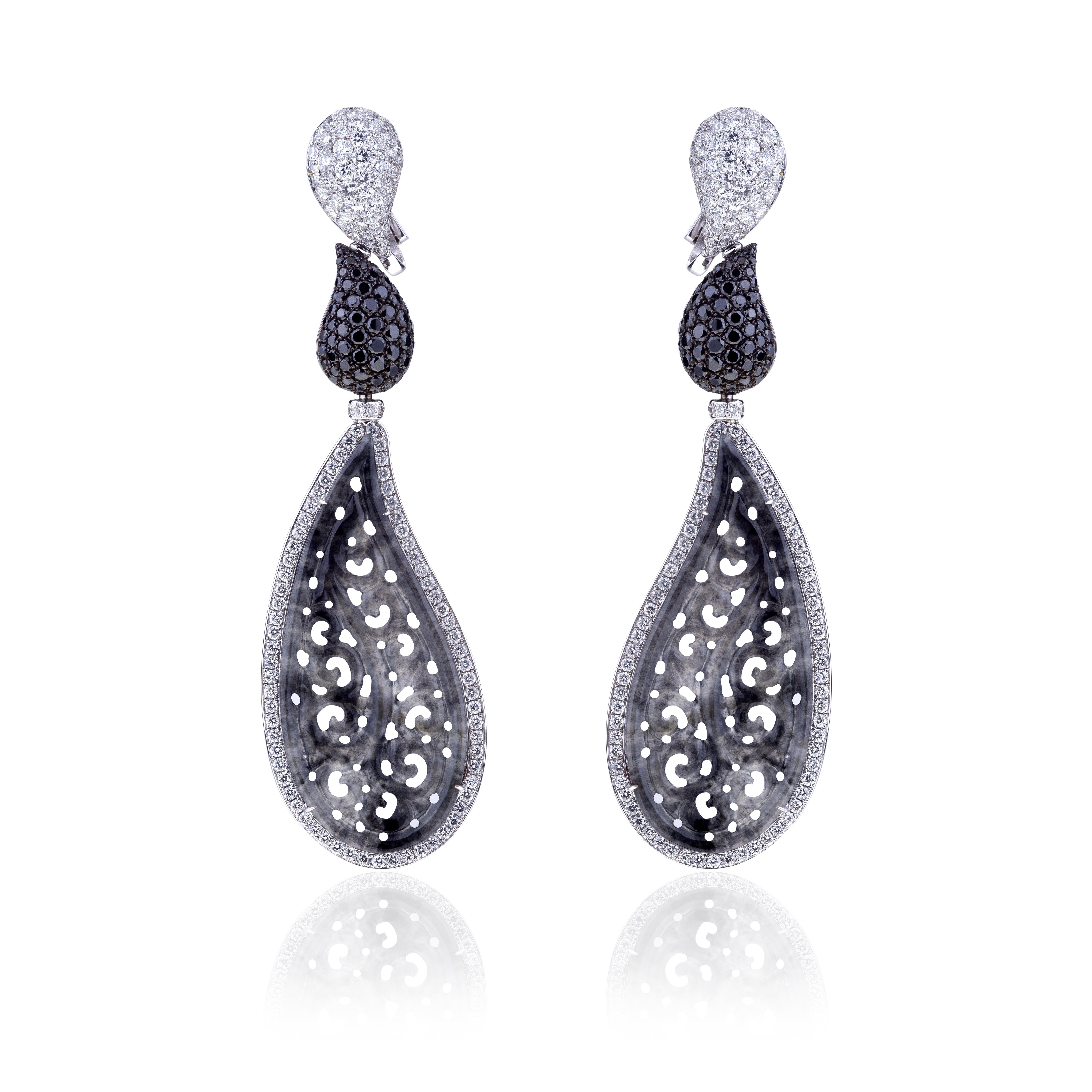 Angeletti Earrings White Gold, Carved Drop Translucent Black Jade And Black&White Diamonds.
The Live Tradition of Jadeite in a Contemporary Italian Design.
Tradition in Carved Jadeite, set in More Contemporary Design, Manifactured in Rome.