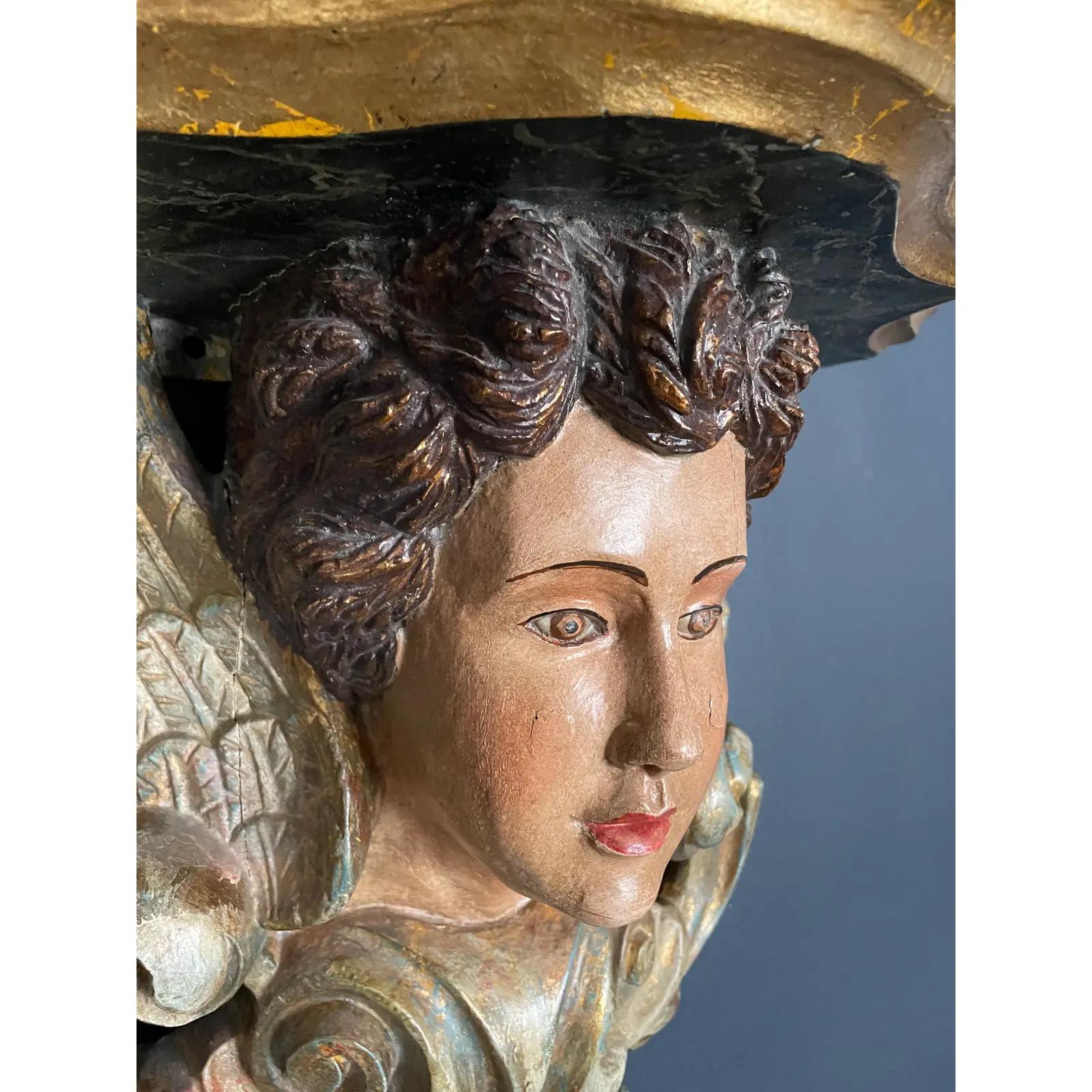 Beautifully appointed sculptural wall shelf. Angelic figure with wings. Hand painted possibly Italian.