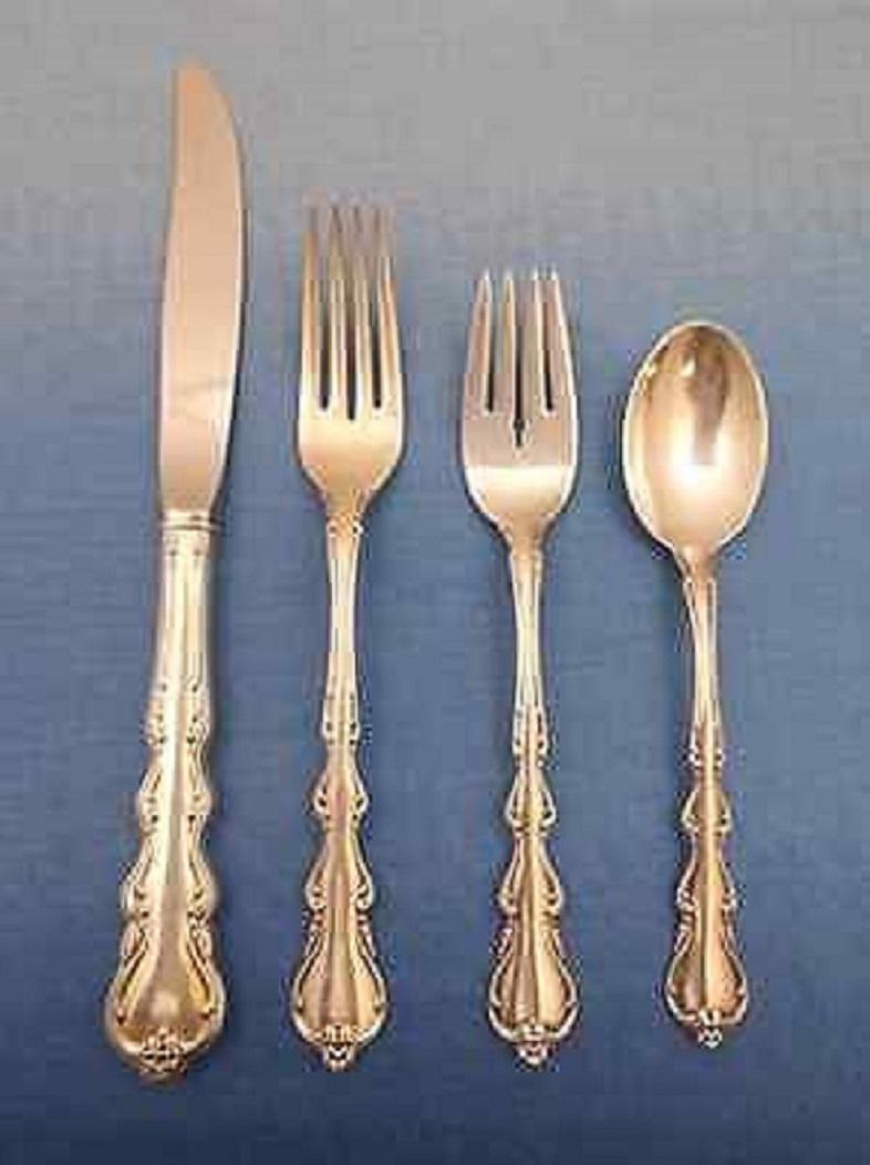 Angelique by International sterling silver flatware set - 51 pieces. This set includes:

12 knives, 9 1/4