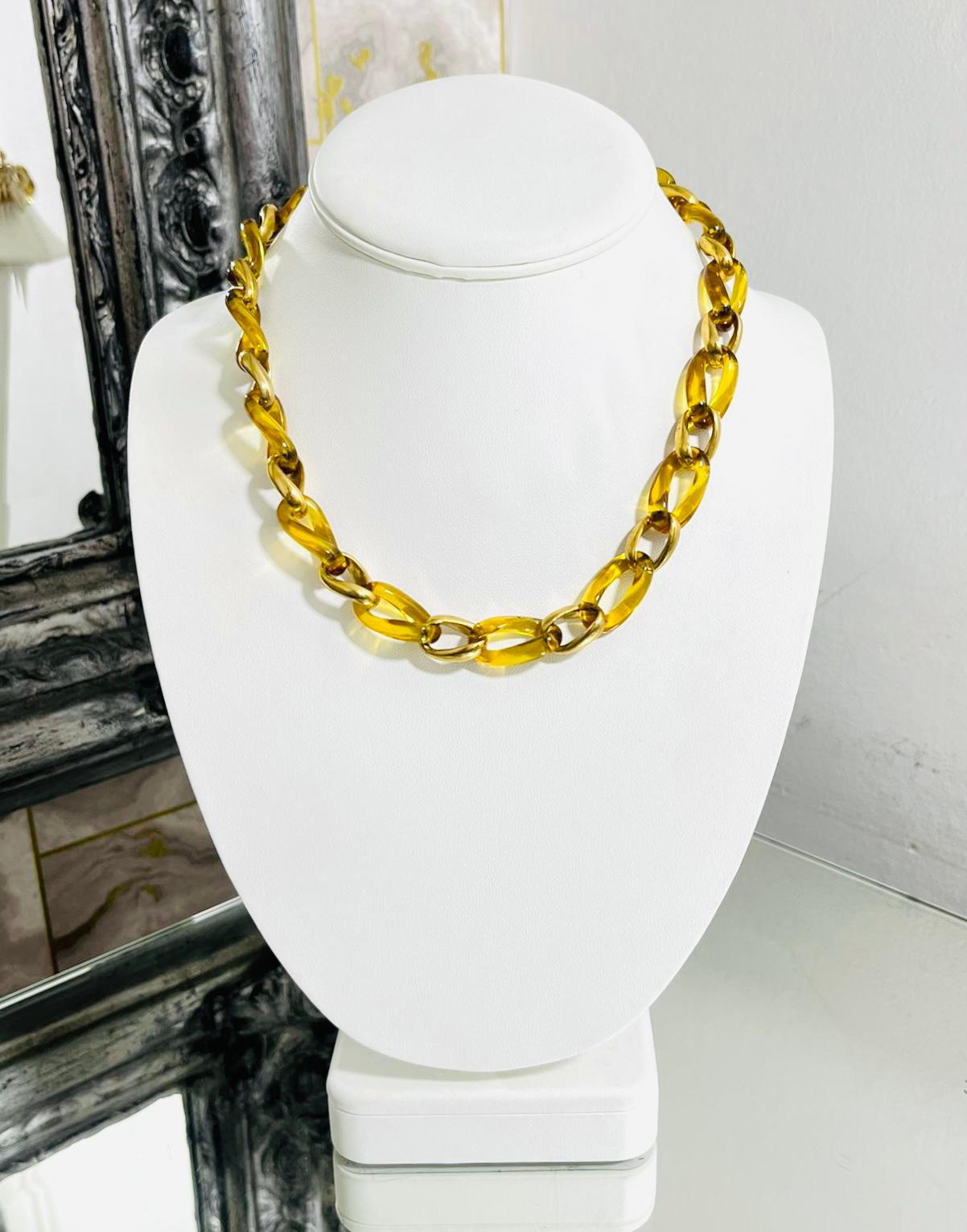 Angelique De Paris Amber Resin & 18K Gold Plated Sterling Silver Link Necklace

Chain necklace designed with amber resin and gold rings alternately linked.

Featuring gold logo embossed medallion and toggle clasp closure with 'Angelique De Paris'