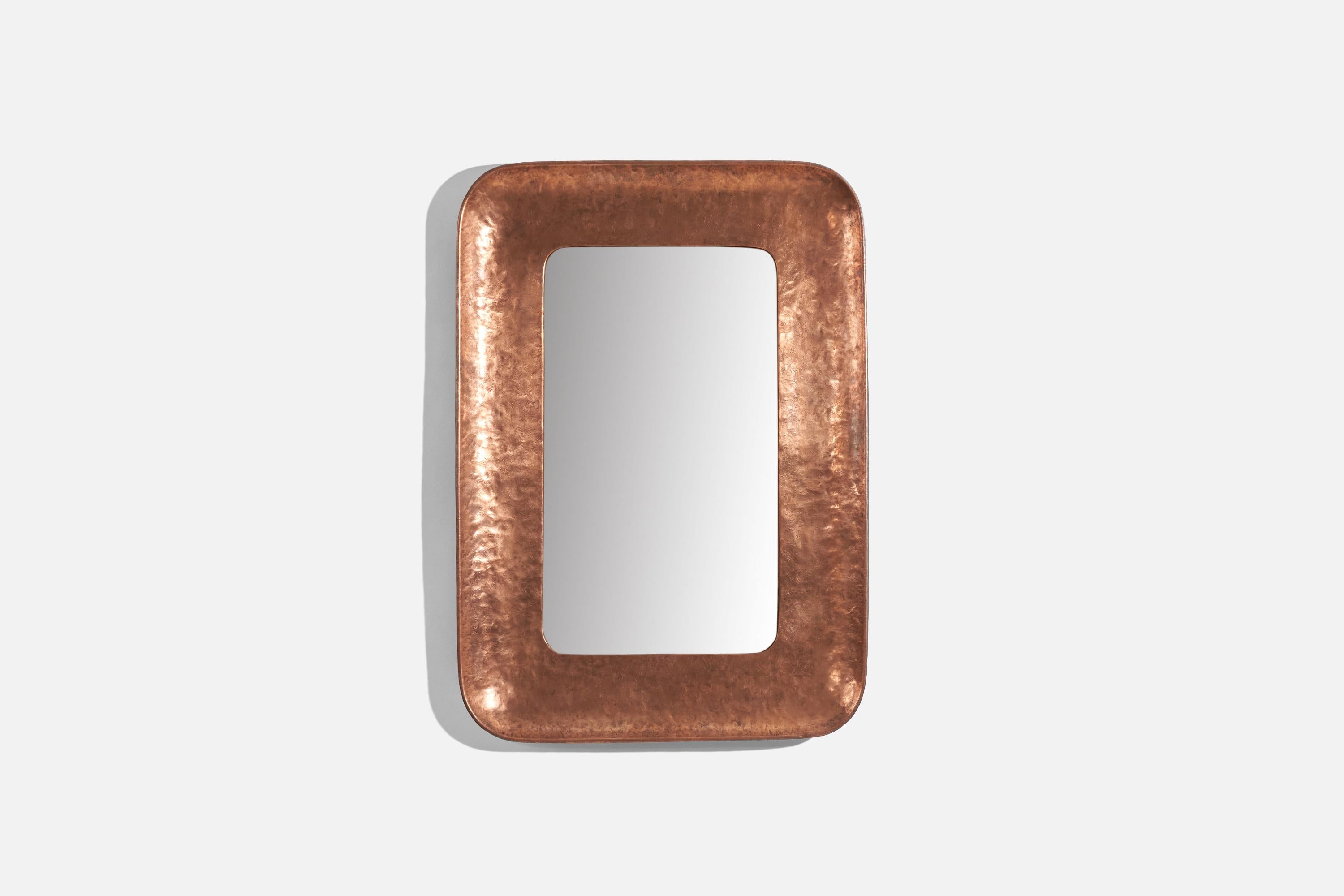A burnished copper wall mirror designed and produced by Angelo Bragalini, Italy, 1950s.
 