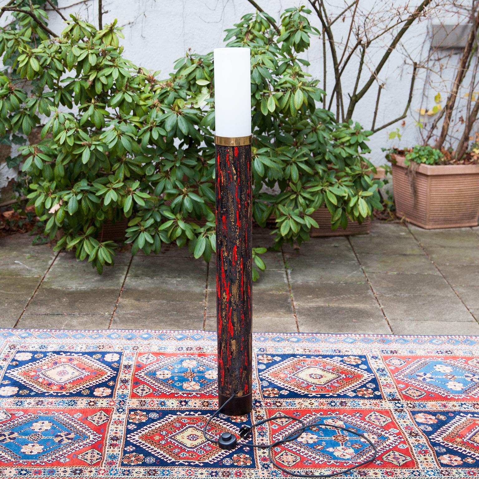 Angelo Brotto tube floor lamp made in enamel copper, brass and a reflector in curved Lucite, for Esperia in the 1960s.

 