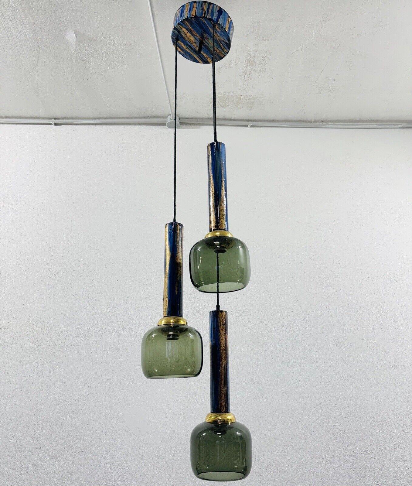 Angelo Brotto Esperia Illuminazioni Emaillierte Kronleuchter Design Modern 1970er Jahre.

Emaillierter Metallrahmen, flaschengrünes Muranoglas, Messingdetails.

Der Artikel ist in sehr gutem Erhaltungszustand, es sind keine ästhetischen oder