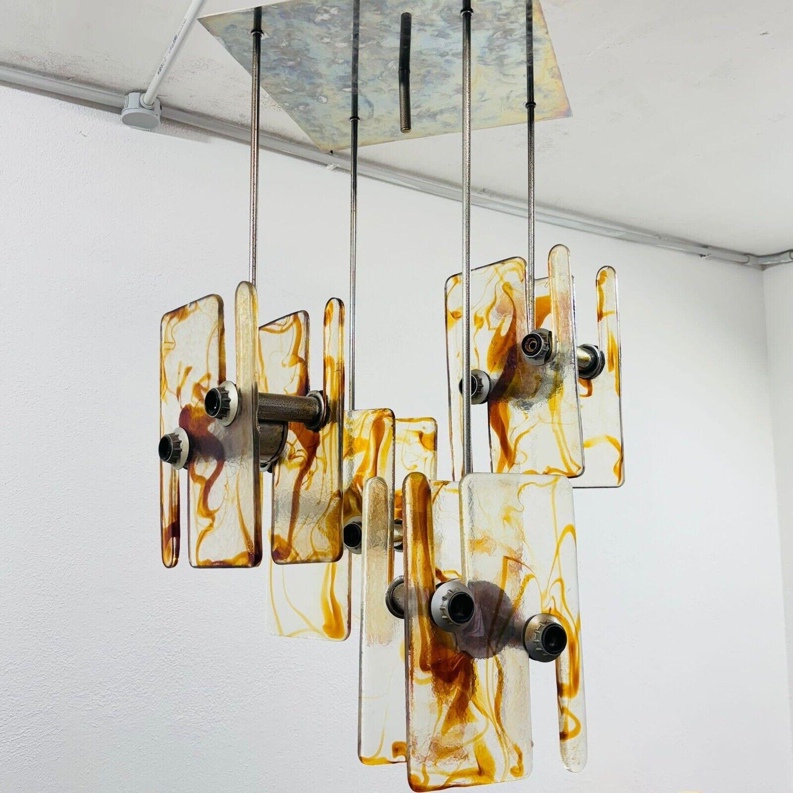 Wonderful chandelier in the style of Angelo Brotto for Esperia, from the 1970s.

An iconic and unique piece for your environments.



Height 85 cm

Maximum diameter 55 cm





The item is in good conservative condition, the glass is perfectly