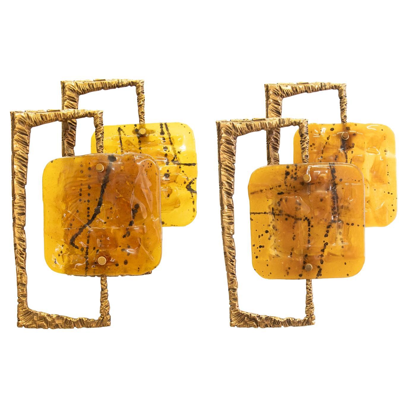 Elegant large pair of italian wall sconces made of bronze and Murano glass in the 1960s by Esperia, designed by Angelo Brotto. Gem from the time. A real eye-catcher even unlit. 

Measures: diameter/width 14” in. (36 cm), height 20.5