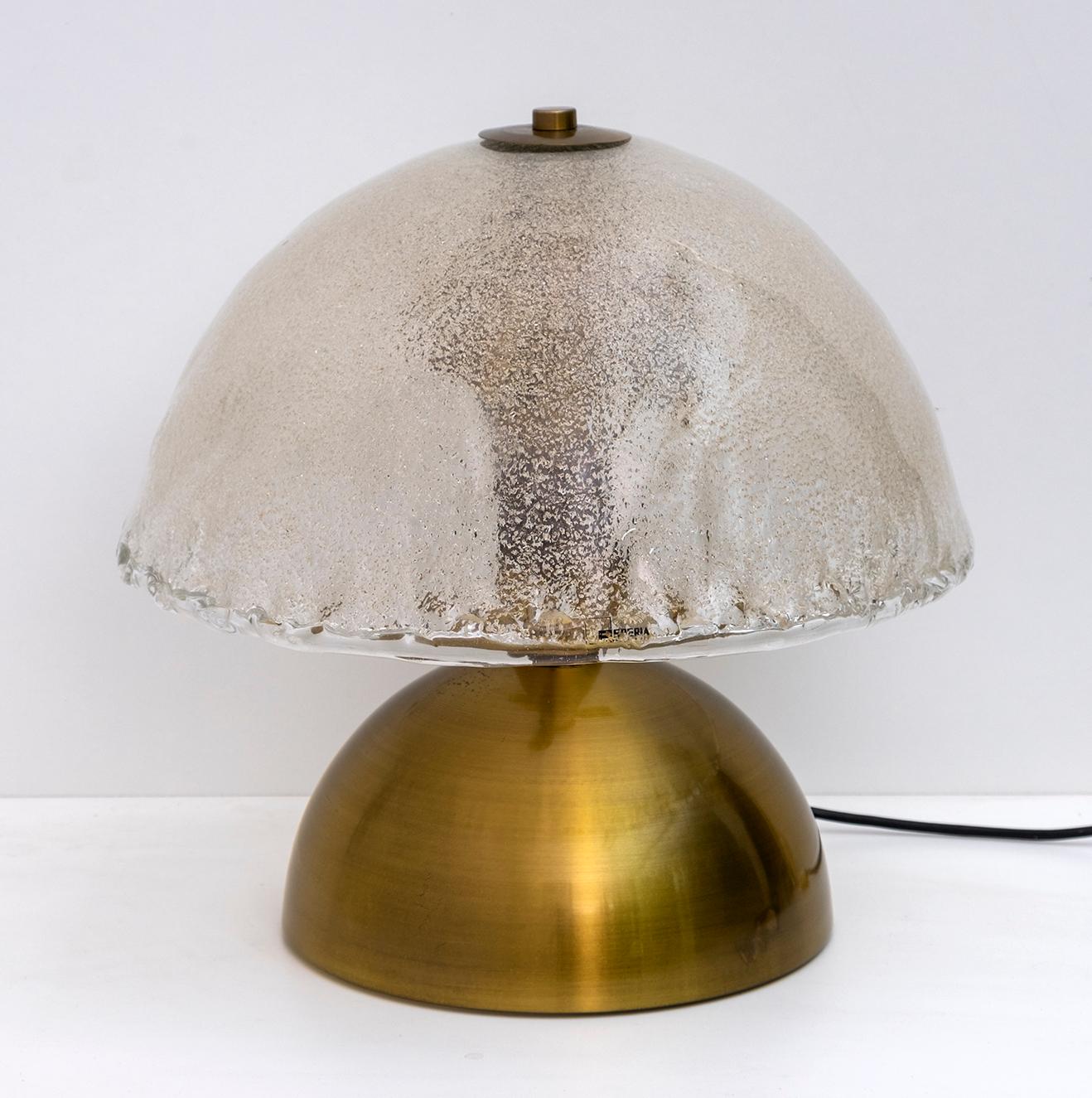 This table lamp in Murano glass Graniglia and brass, was designed by the famous Italian designer Angelo Brotto for the Esperia glass factory in Murano. Production of the 70s.
The lamp mounts three E27 bulbs

Angelo Brotto was a Venetian designer