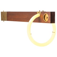 Used Angelo Brotto neon wall light in walnut and brass