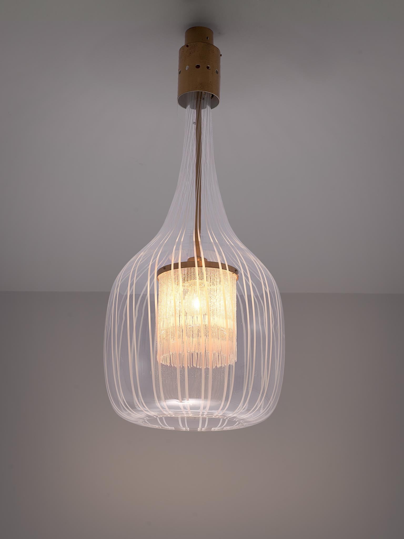 Angelo Brotto for Esperia, ceiling light, glass, cotton and brass, Italy, 1970s

A lantern designed by Angelo Brotto, executed in blown Murano glass. Inside the glass shade is a fringe of cotton that surrounds the light bulb. The pendant is finished