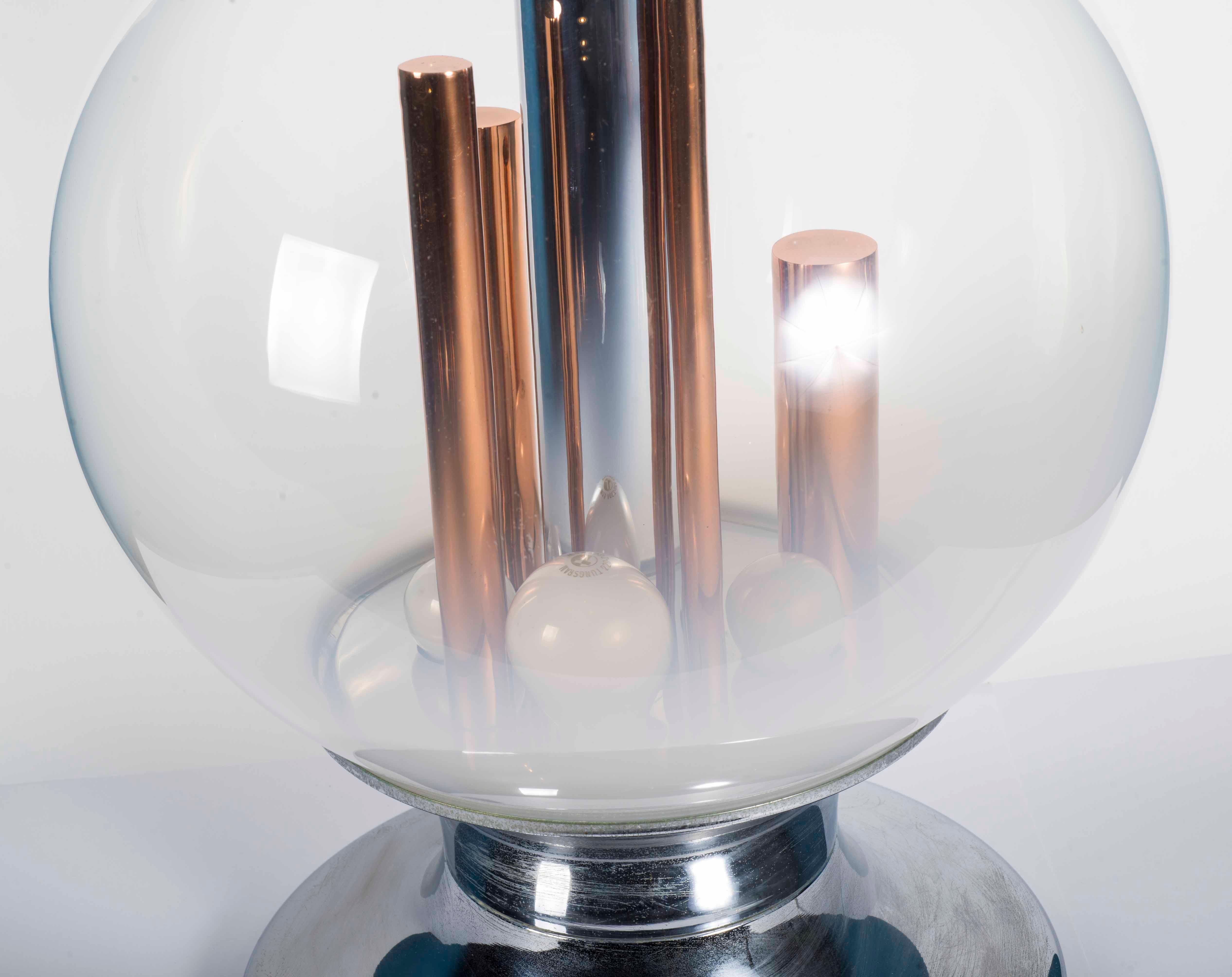 Table lamp by Angelo Brotto from the 1960s. Chrome base, glass globe and copper tubes. Murano Glass. Light can be dimmed.