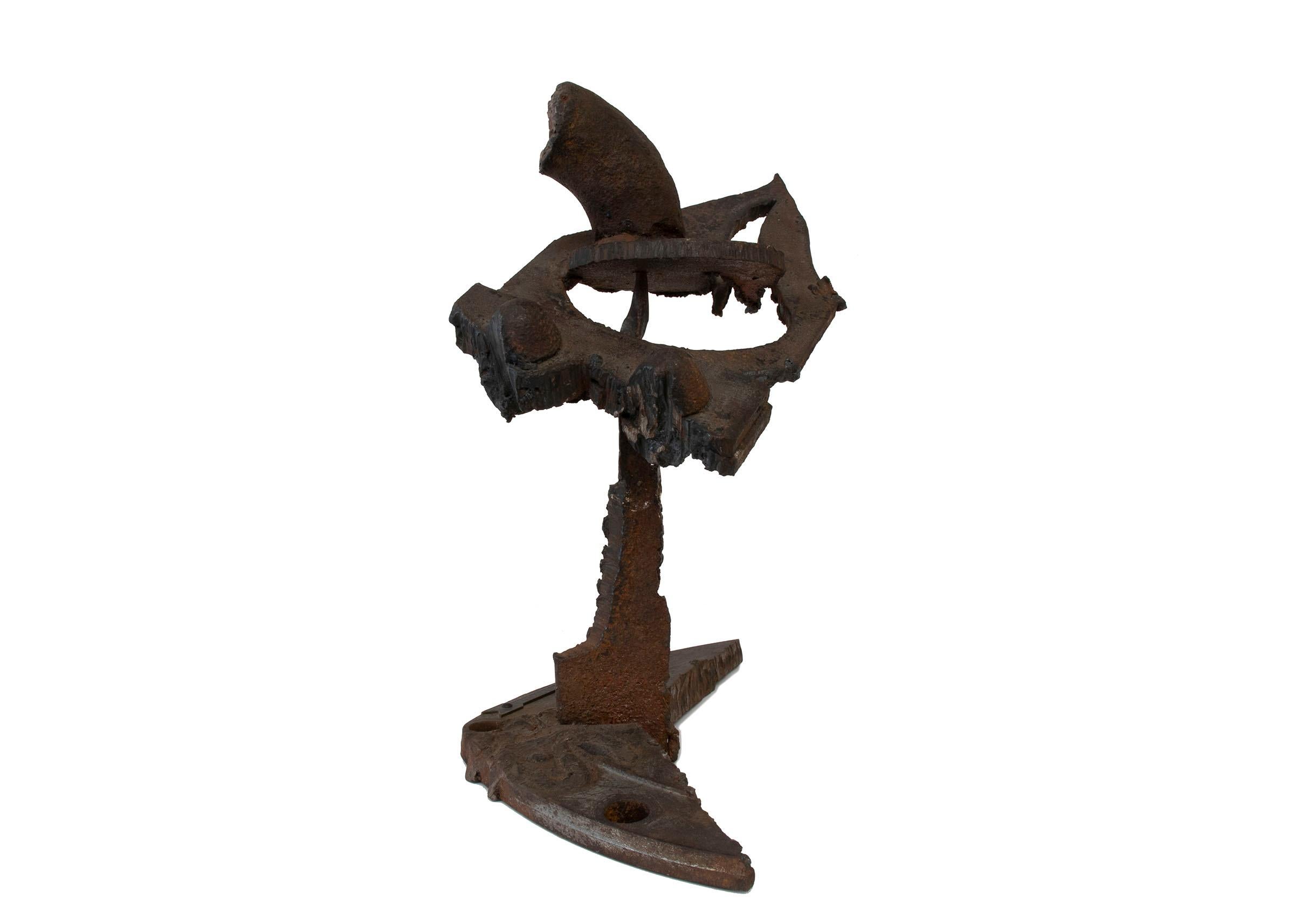 This stunning, one-of-a-kind abstract metalwork sculpture is an original creation by renowned American artist Angelo Di Benedetto (1913-1992). Measuring 13 ¼ x 11 ¼ x 7 ½ inches, this mid-century modern masterpiece exemplifies Di Benedetto's