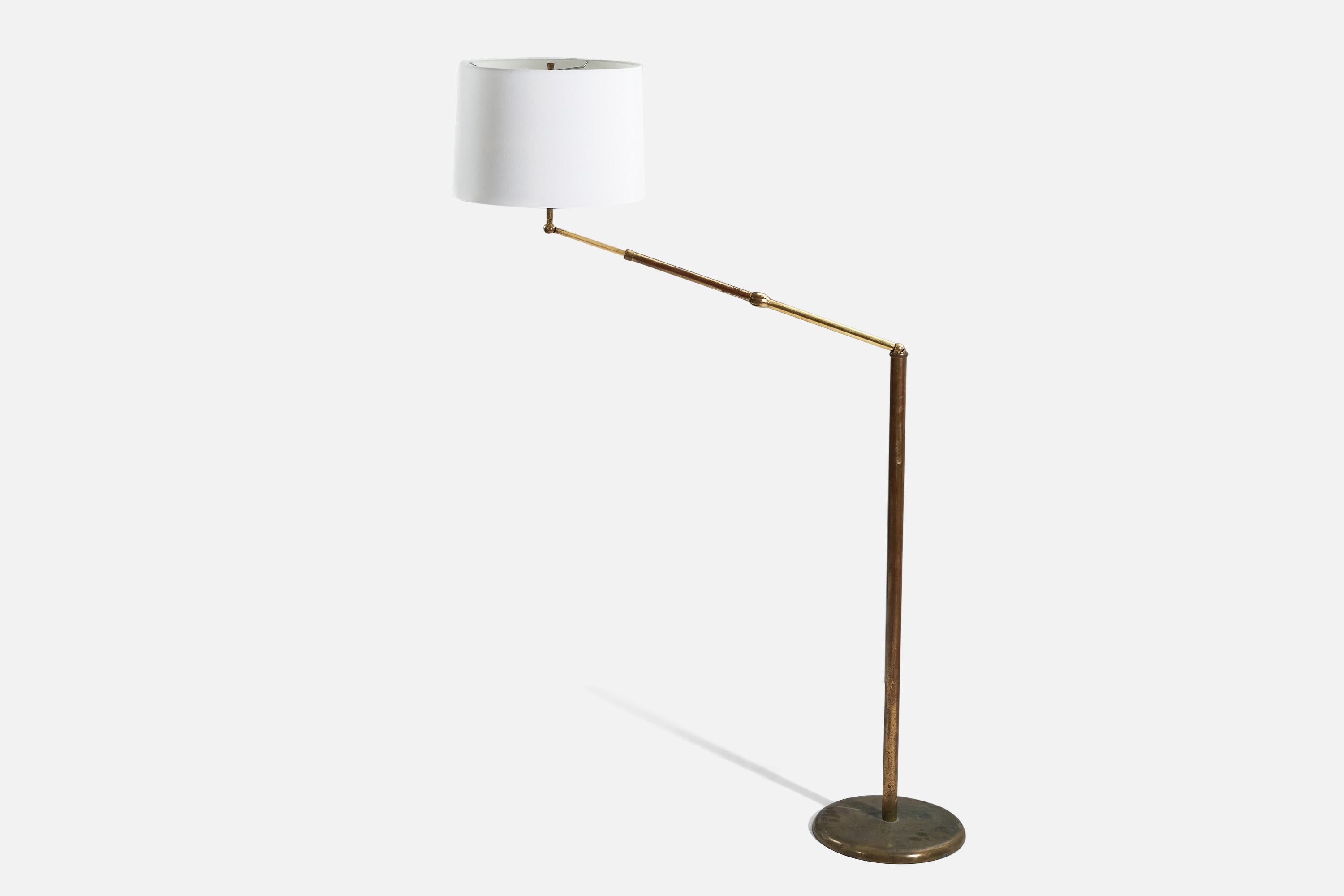 A brass and fabric floor lamp designed by Angelo Lelii and produced by Arredoluce, Italy, 1950s. 

Variable dimensions, measured as illustrated in the first image. 
Sold with Lampshade. 
Stated dimensions refer to the floor lamp with the shade.