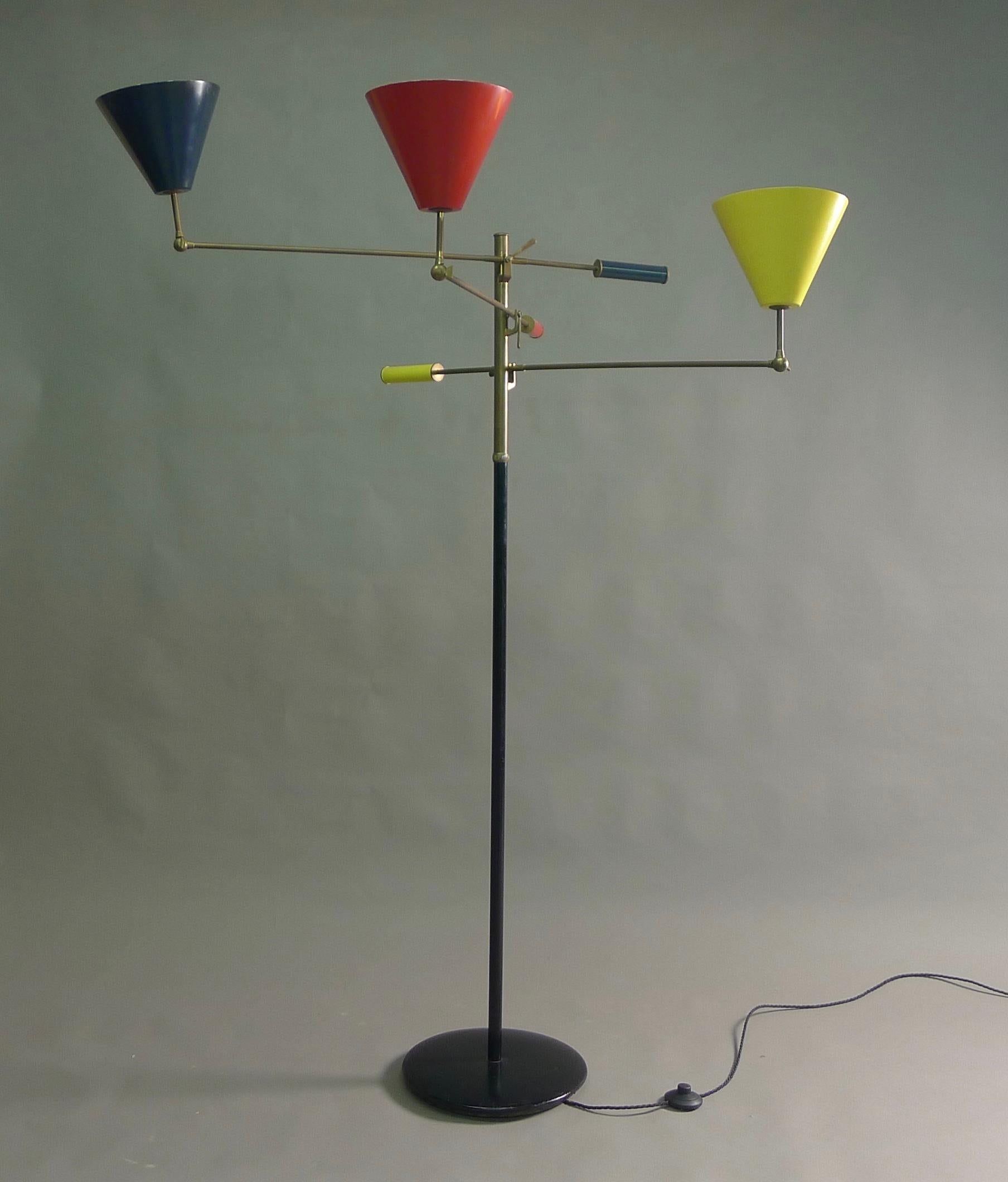 Angelo Lelii for his own company, Arredoluce, Monza, Italy. Circa 1950. This example of the iconic Triennale lamp is the very first version, it features a metal base lacquered black, the stem post is black below a brass collar, the upper brass part