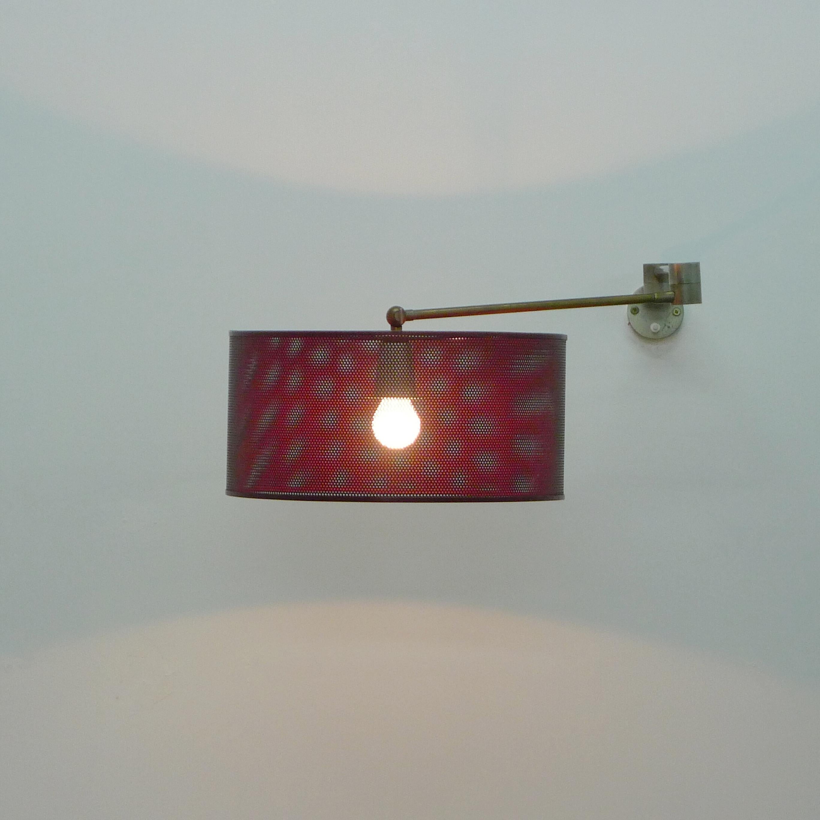 Italian Angelo Lelii for Arredoluce, Adjustable Wall Light with Red Mesh Shade, 1950s For Sale