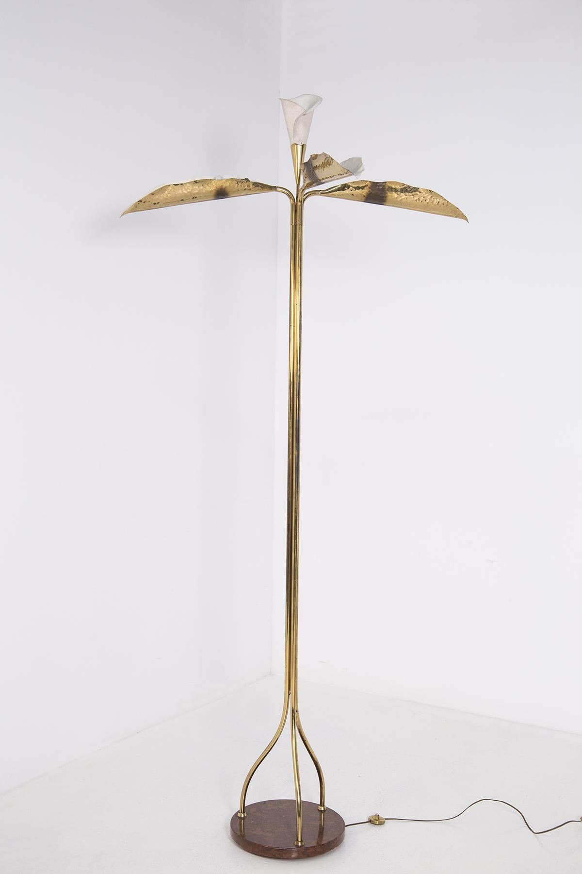 Elegant floor lamp by Angelo Lelii for the Arrodoluce manufactory in the 1950s. The lamp is made entirely of gilded brass and painted aluminum, composed of three 