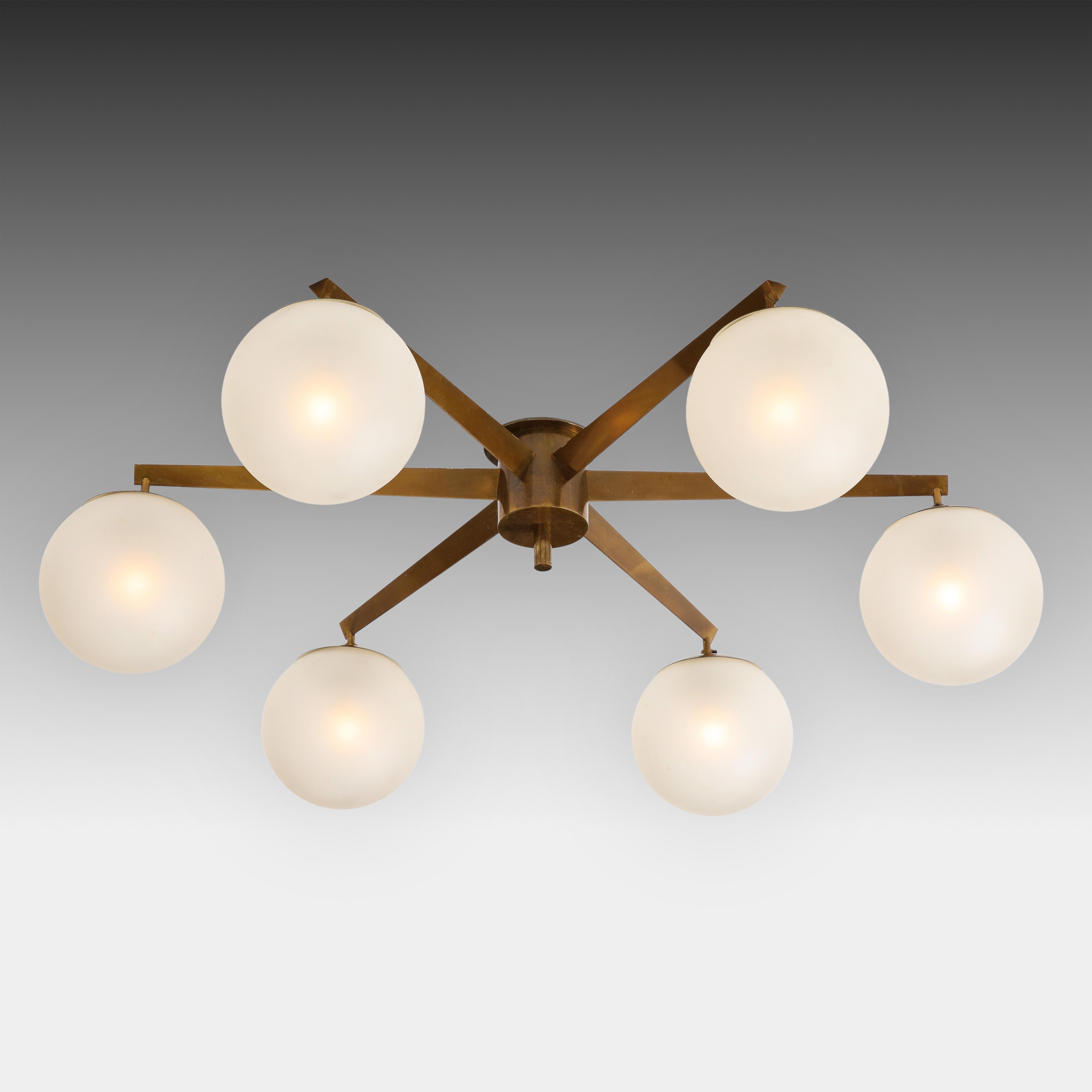 Angelo Lelli for Arredoluce rare original Stella a 6 chandelier or flush mount ceiling light with six satin or acid-etched glass globe shades suspended from brass structure in a starburst shape and mount, Italy, circa 1959.  This rare Stella a 6