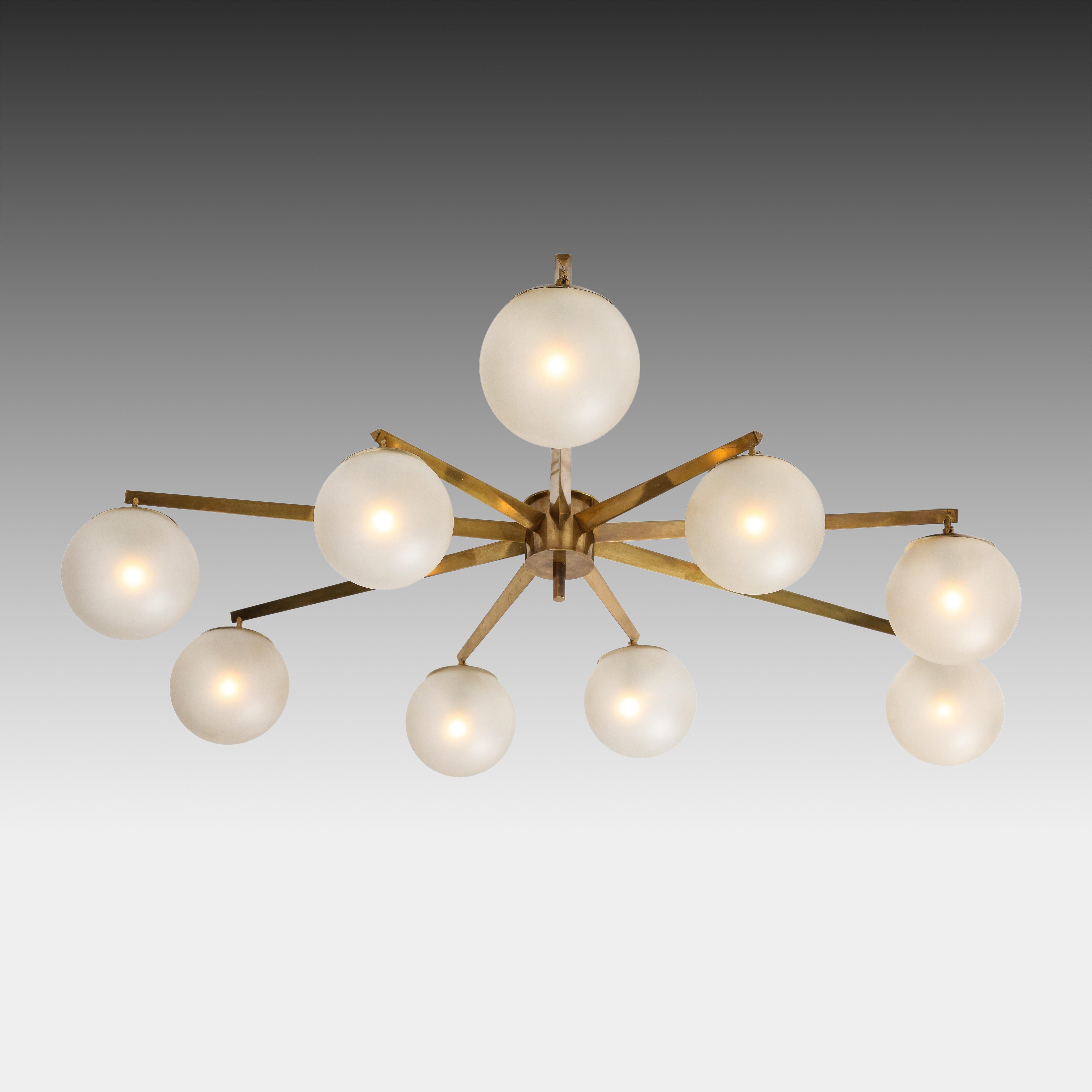 Angelo Lelli for Arredoluce very rare original Stella a 9 chandelier or flush mount ceiling light with six satin or acid-etched glass globe shades suspended from brass structure in a starburst shape and mount, Italy, circa 1959.  This rare Stella a