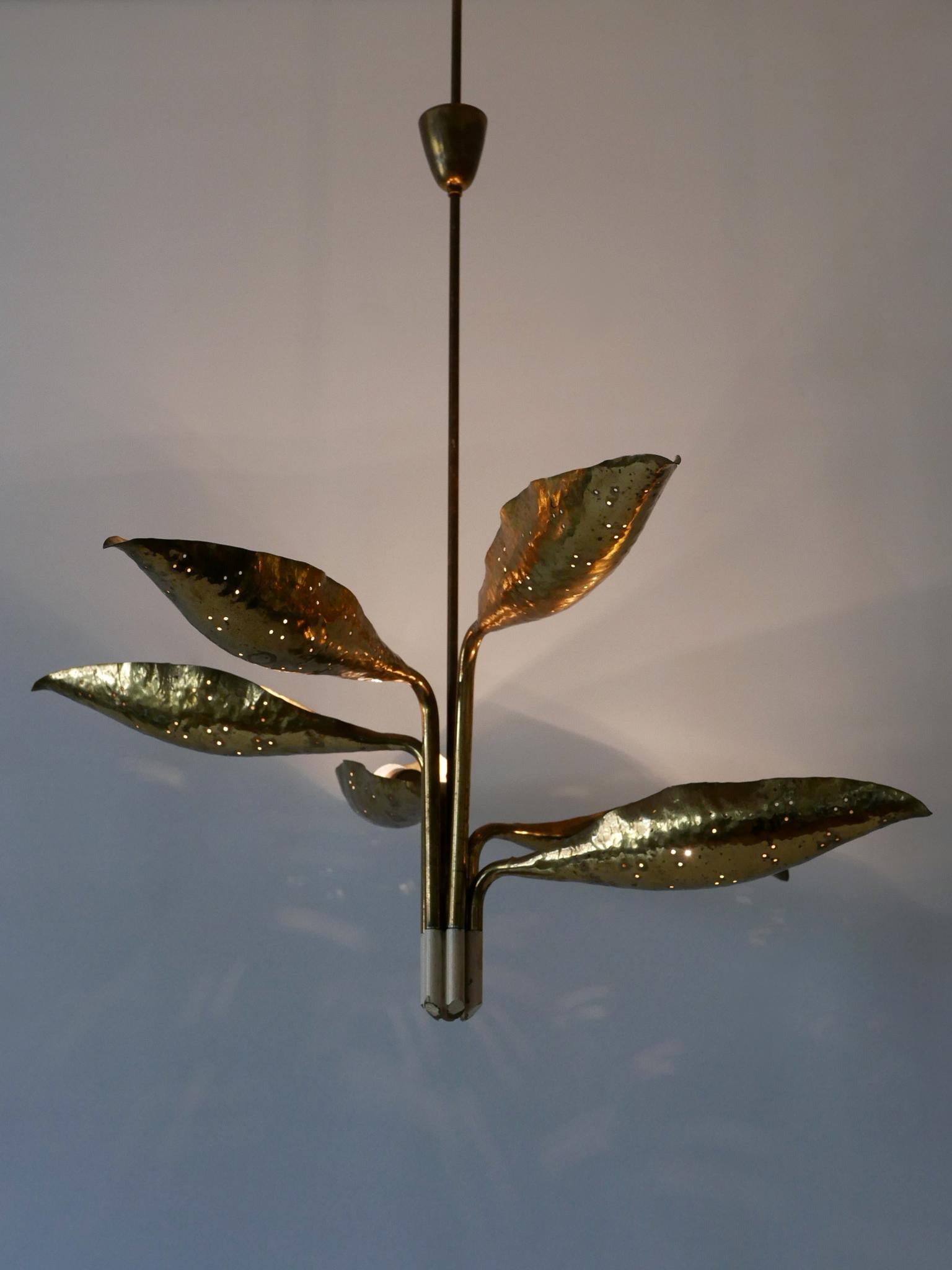 Extremely rare, elegant and highly decorative Mid-Century Modern hammered and perforated brass leaf chandelier or pendant light. Model n° 12369. With six organic shaped, rotating lamp shades / arms. Designed by Angelo Lelii (Lelli) for Arredoluce,