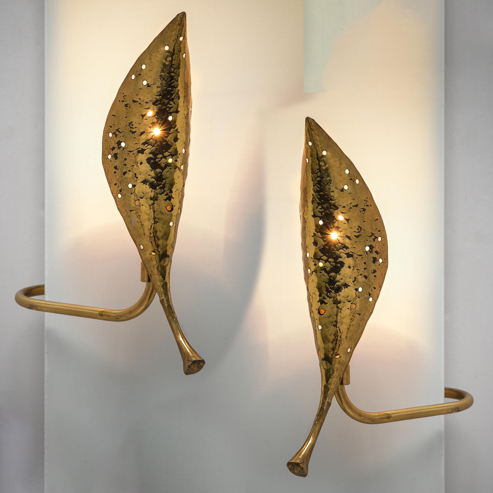Angelo Lelii, ‘leaf’ wall lights, brass, Italy, circa 1951

These one-of-a-kind wall lights by Angelo Lelii strongly remind of his chandelier model 12369, which we currently have in our collection too. In a period of his career, Lelii designed